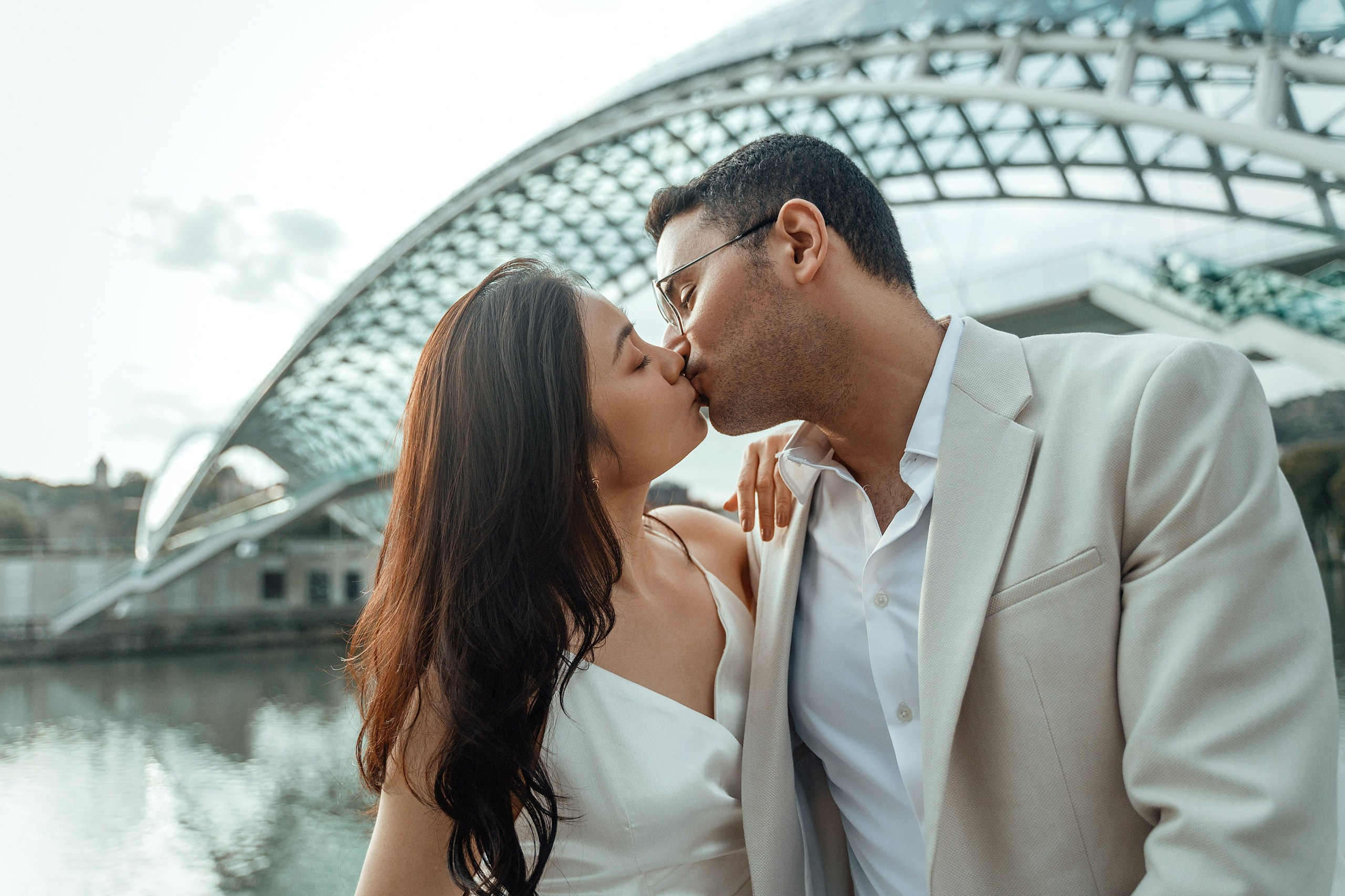 Alaeddine & Matika on the Peace Bridge in Tbilisi. Photographer Sergey Otkrytyi in Batumi & Tbilisi