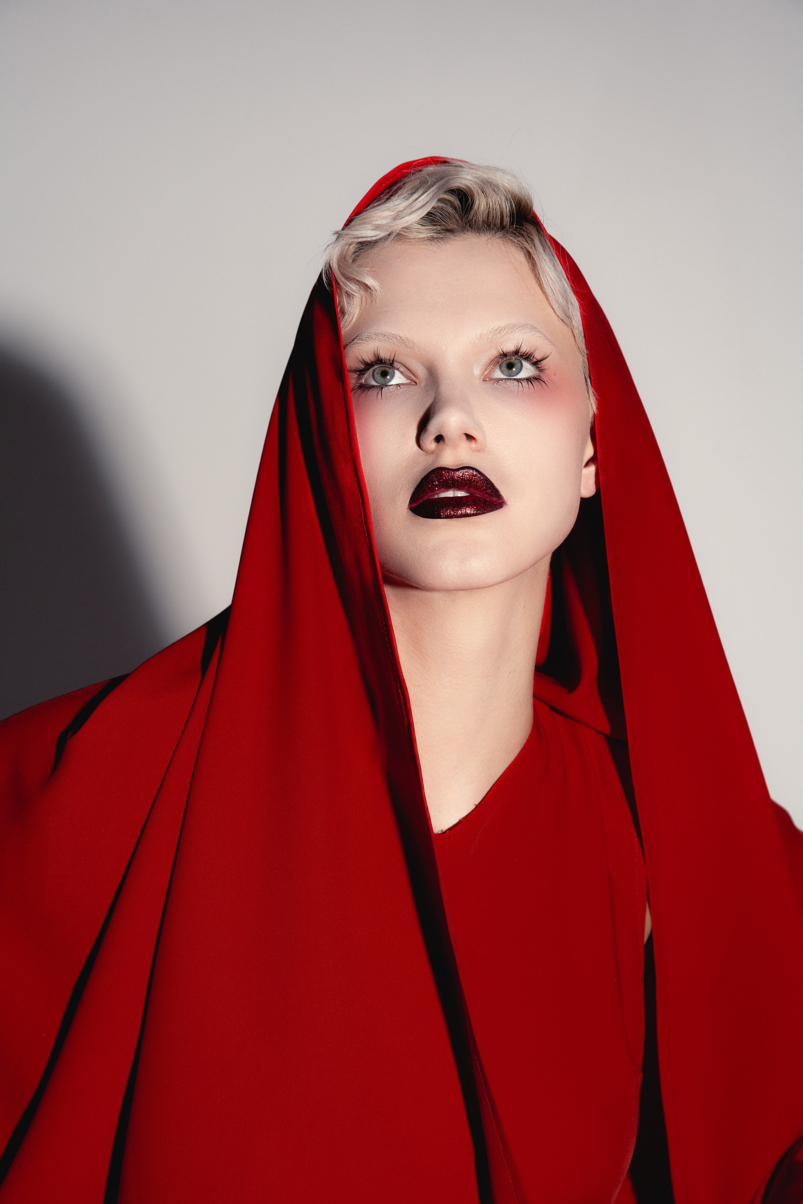 Red. Photographer. Producer. Retoucher