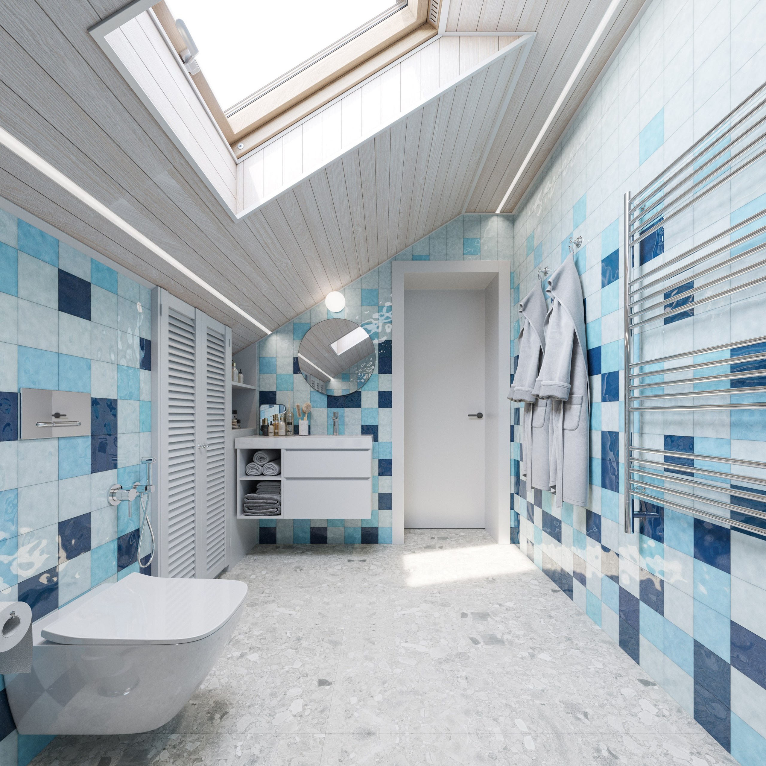 Яркая и светлая ванная комната с синей плиткой и мансардным окном в загородном доме