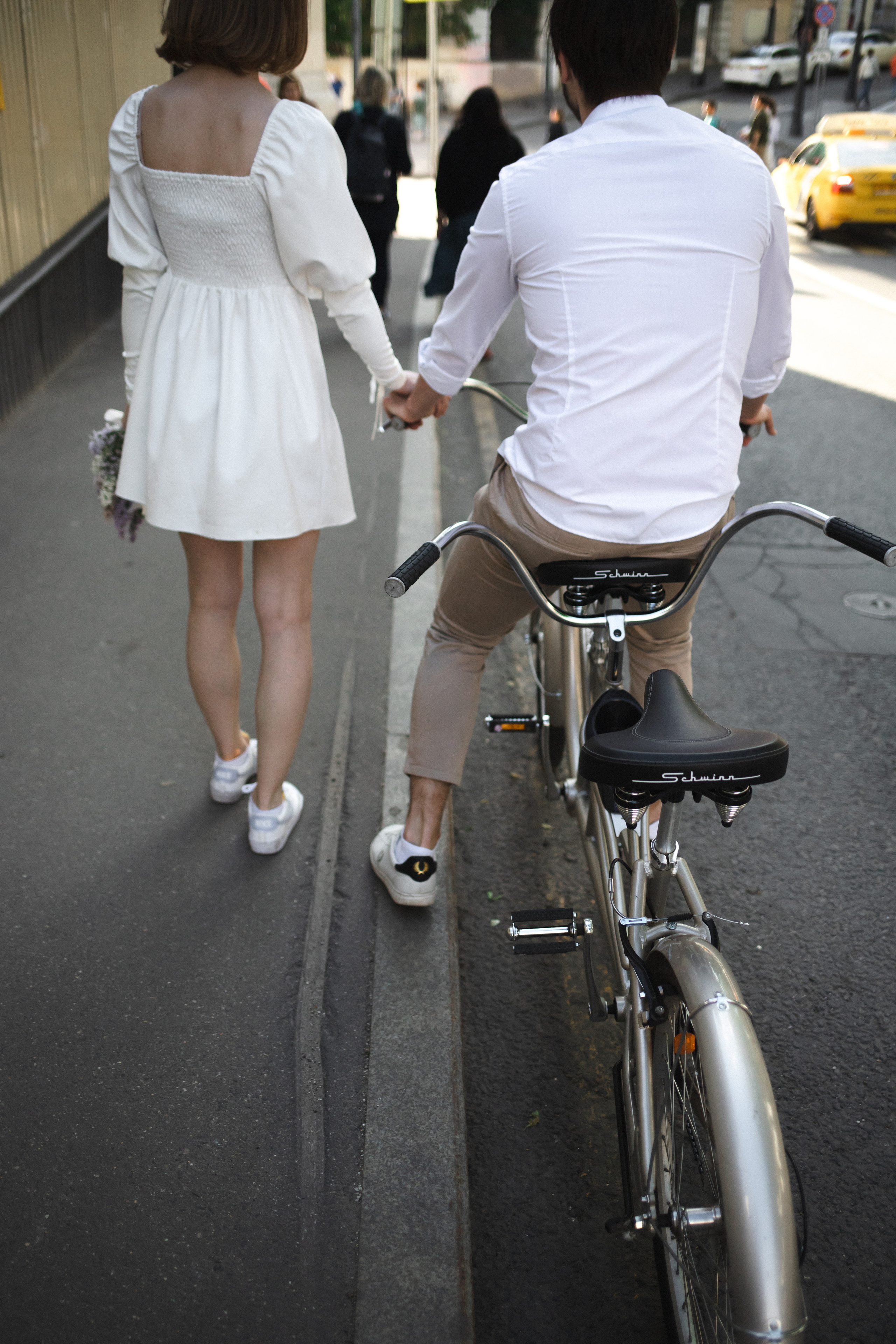A date on a bicycle. Wedding and family photographer