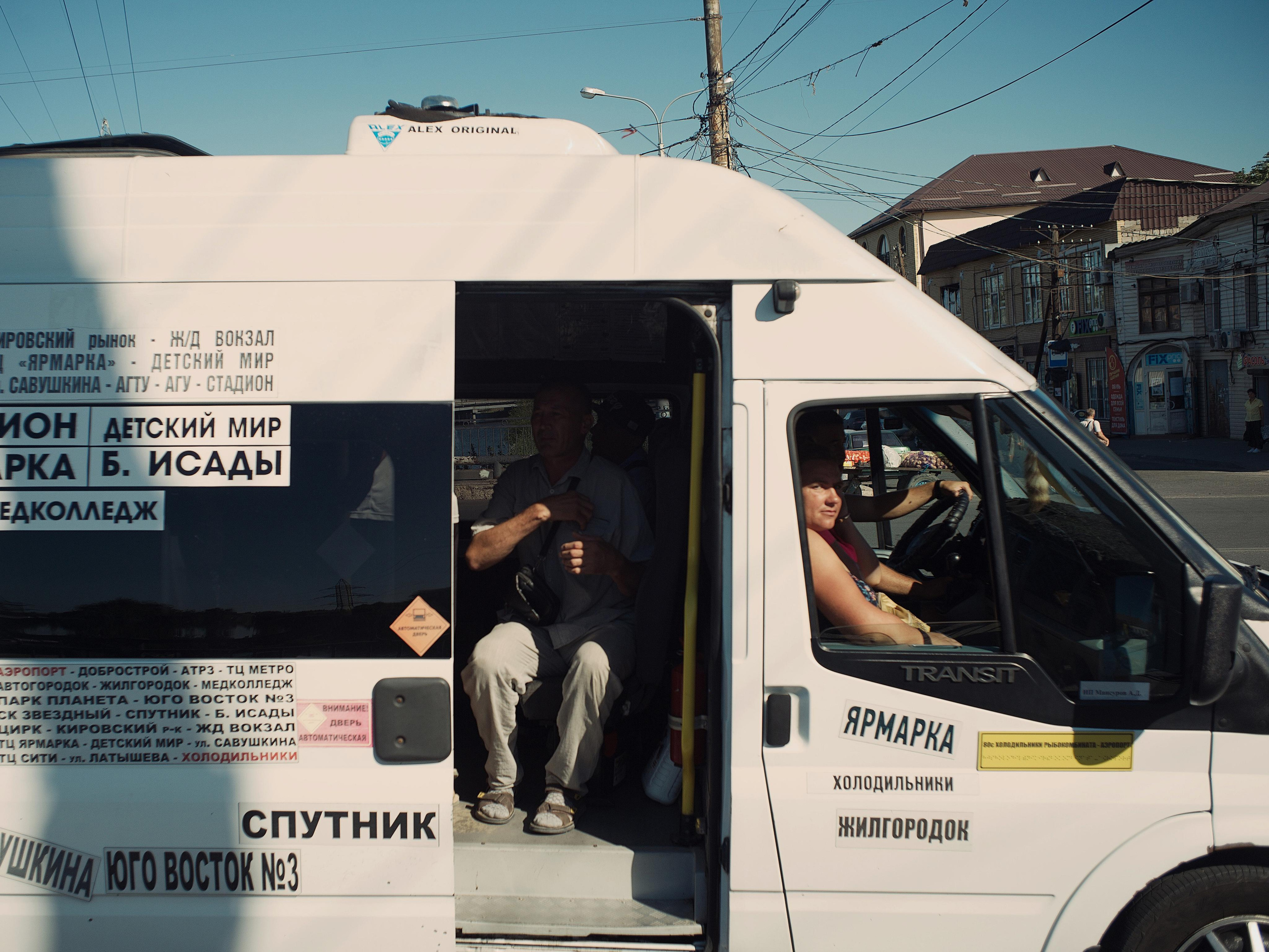An urban minibus. In the latest years, after the abolition of buses and trams, there was no municipal transport in Astrakhan at all, and people were forced to use such commercial minibuses, often packed. However, in 2023, modern municipal buses began appearing on the streets. But the main transport is still minibuses