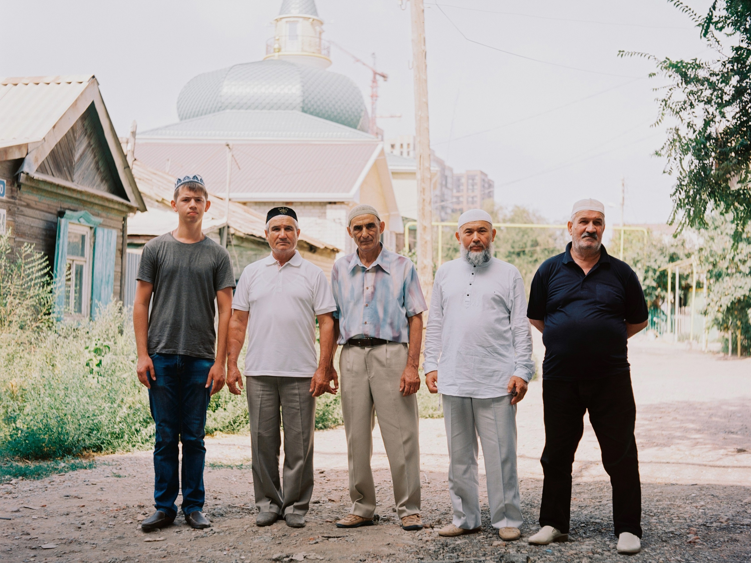 Astrakhan Tatars. Menzhinsky Street, where the picture was taken, was one of the largest in the city at the beginning of the 20th century, trams ran. Now it's just a rural primer. Probably, the area is being prepared for demolition – there is an embankment nearby, above which elite new buildings are already towering