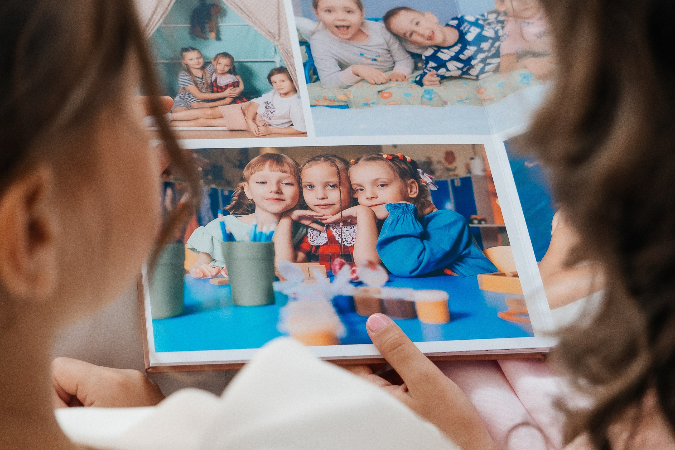 Про разновозрастные группы. Детские выпускные альбомы в Красноярске