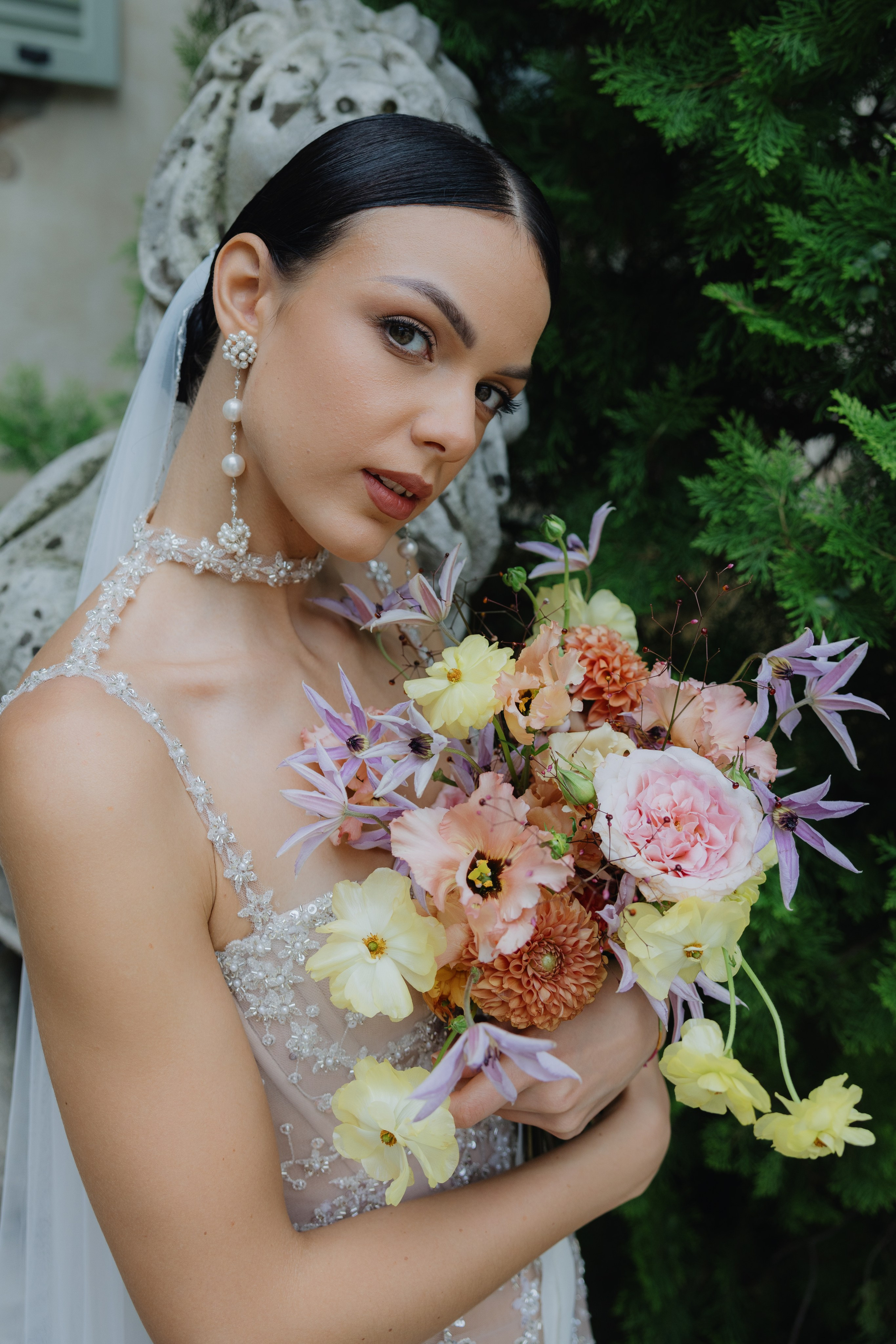 Editorial bridal portrait behind a wedding veil