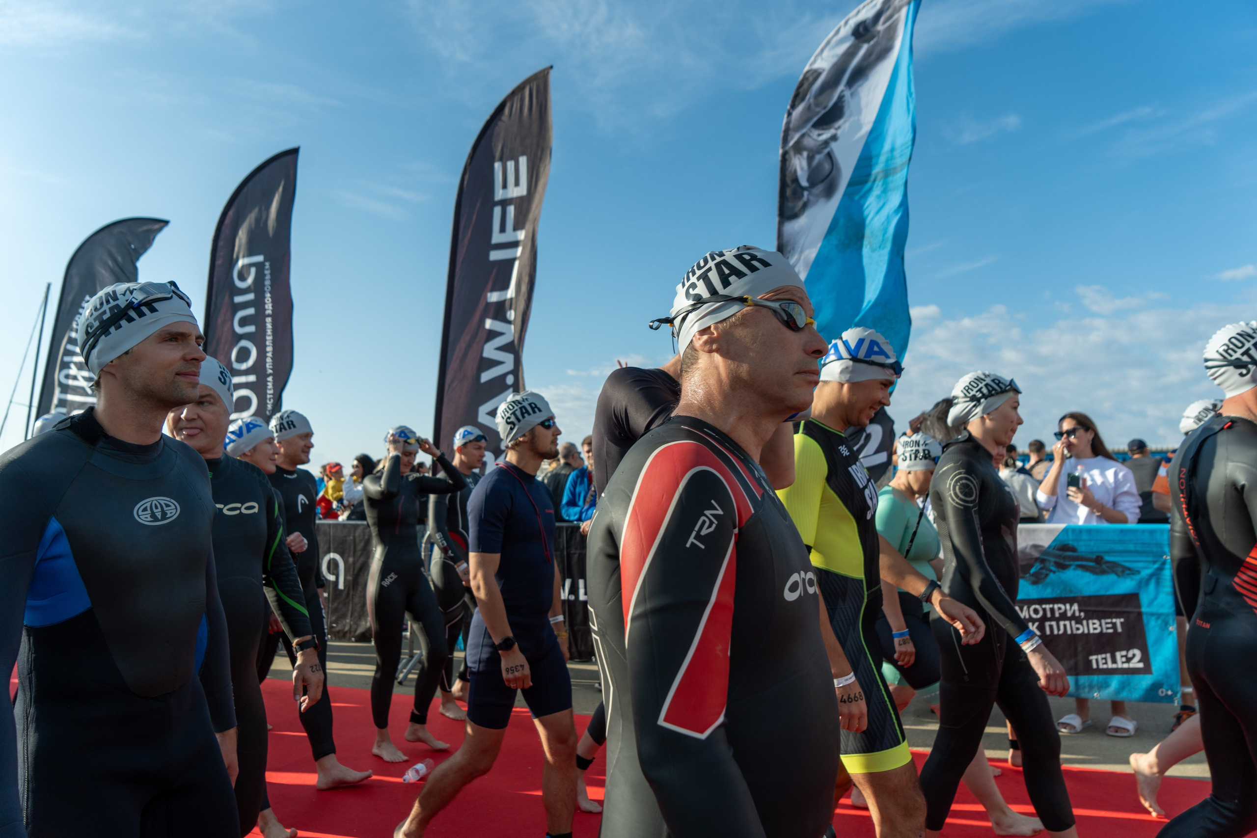 Фотоотчет партнерской интеграции для компании TELE2 на фестивале Ironstar. Репортажный фотограф в Красной Поляне и Сочи Павлюченко Екатерина