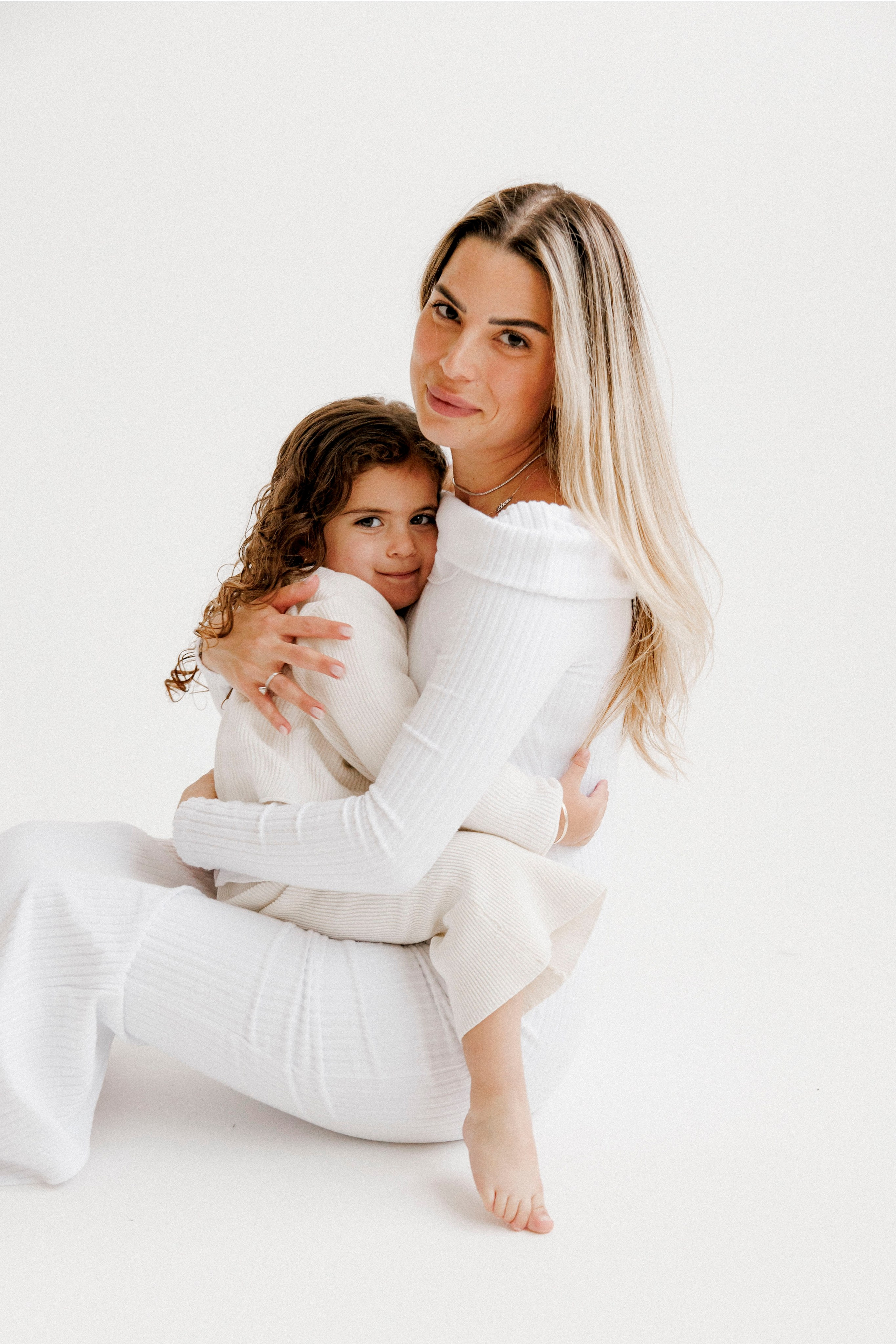 Family photoshoot in White Studio. Wedding and family photographer