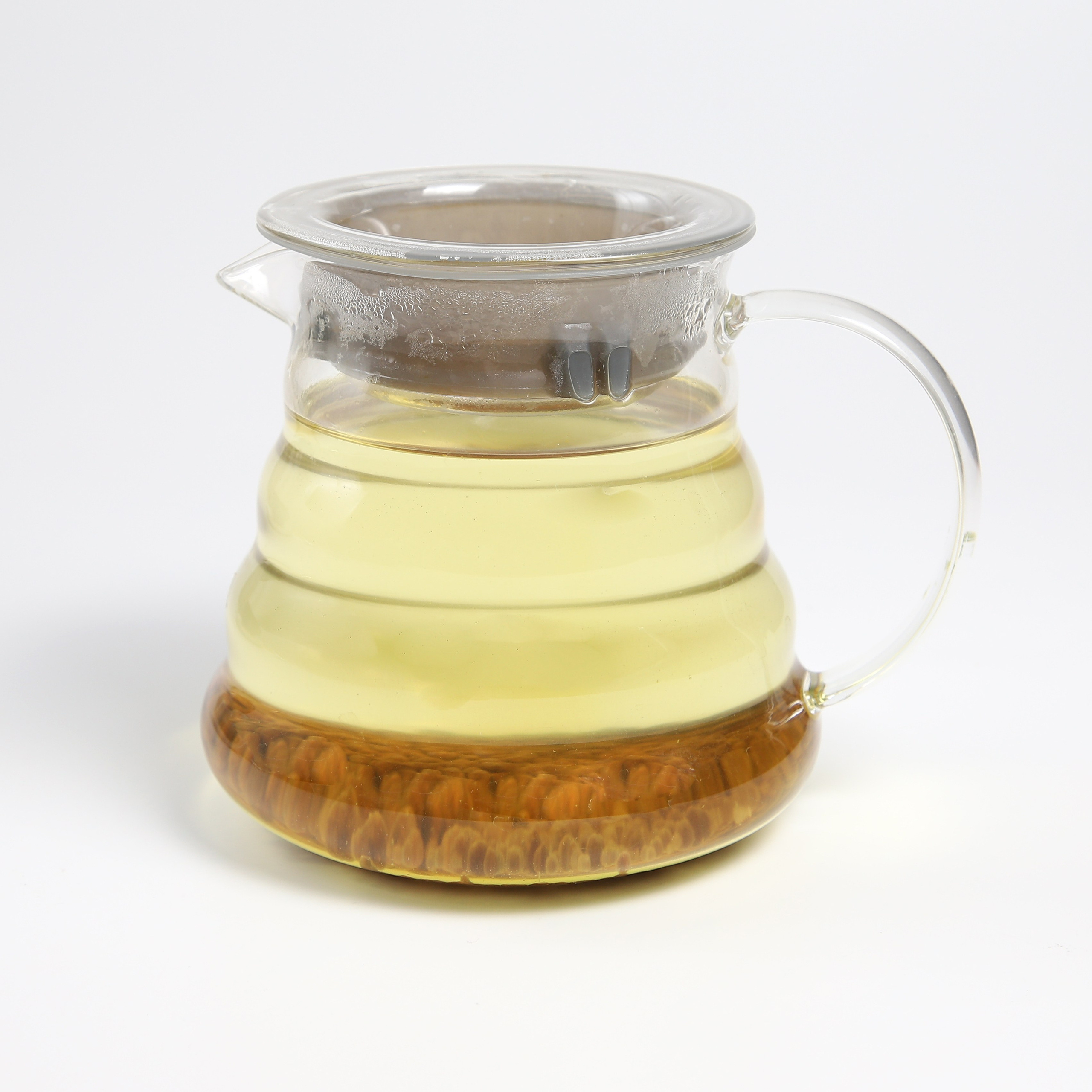 Фуд-фотография чайника с зелёным чаем.