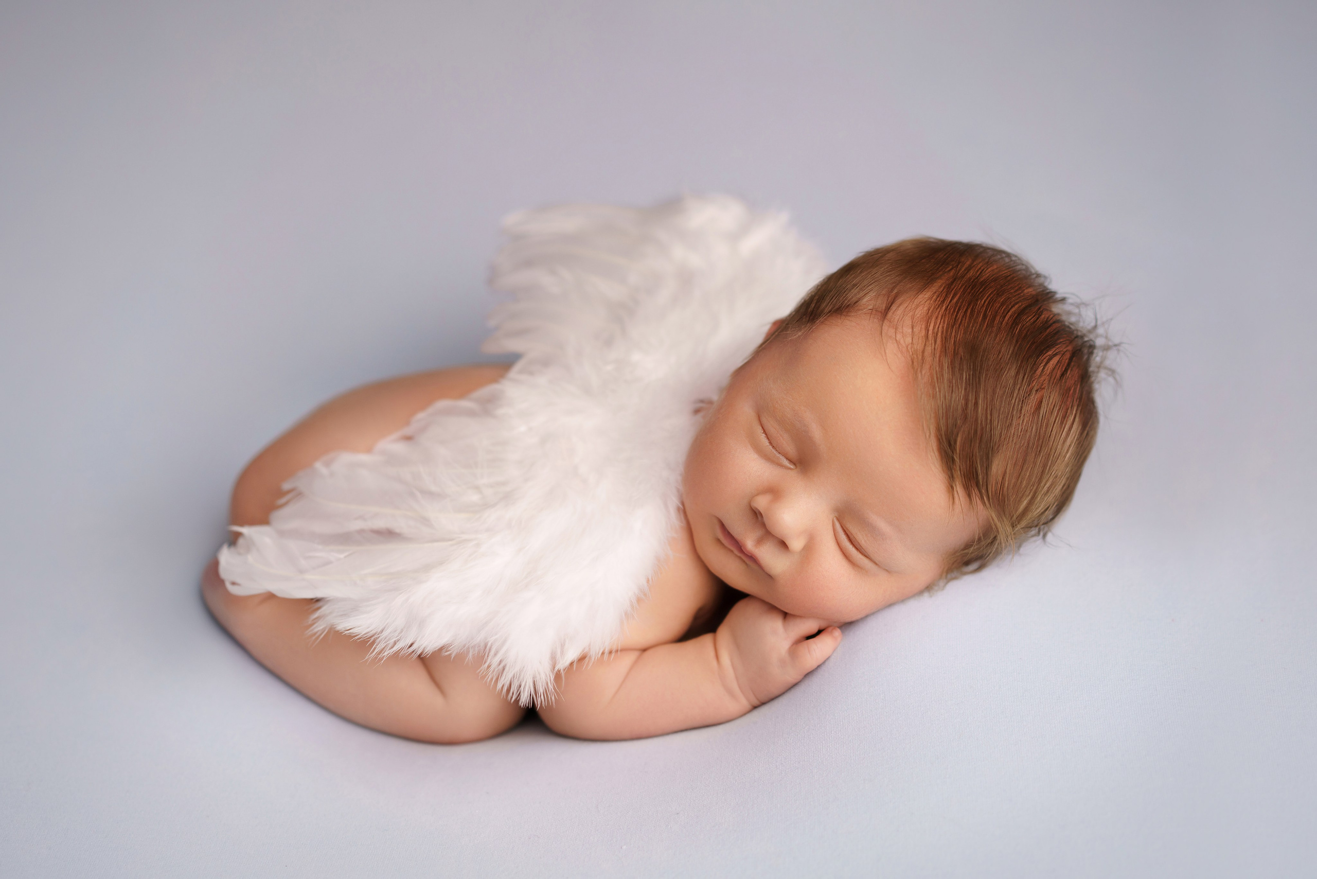 Фотограф новорожденных в Митино - профессиональная съемка newborn на дому