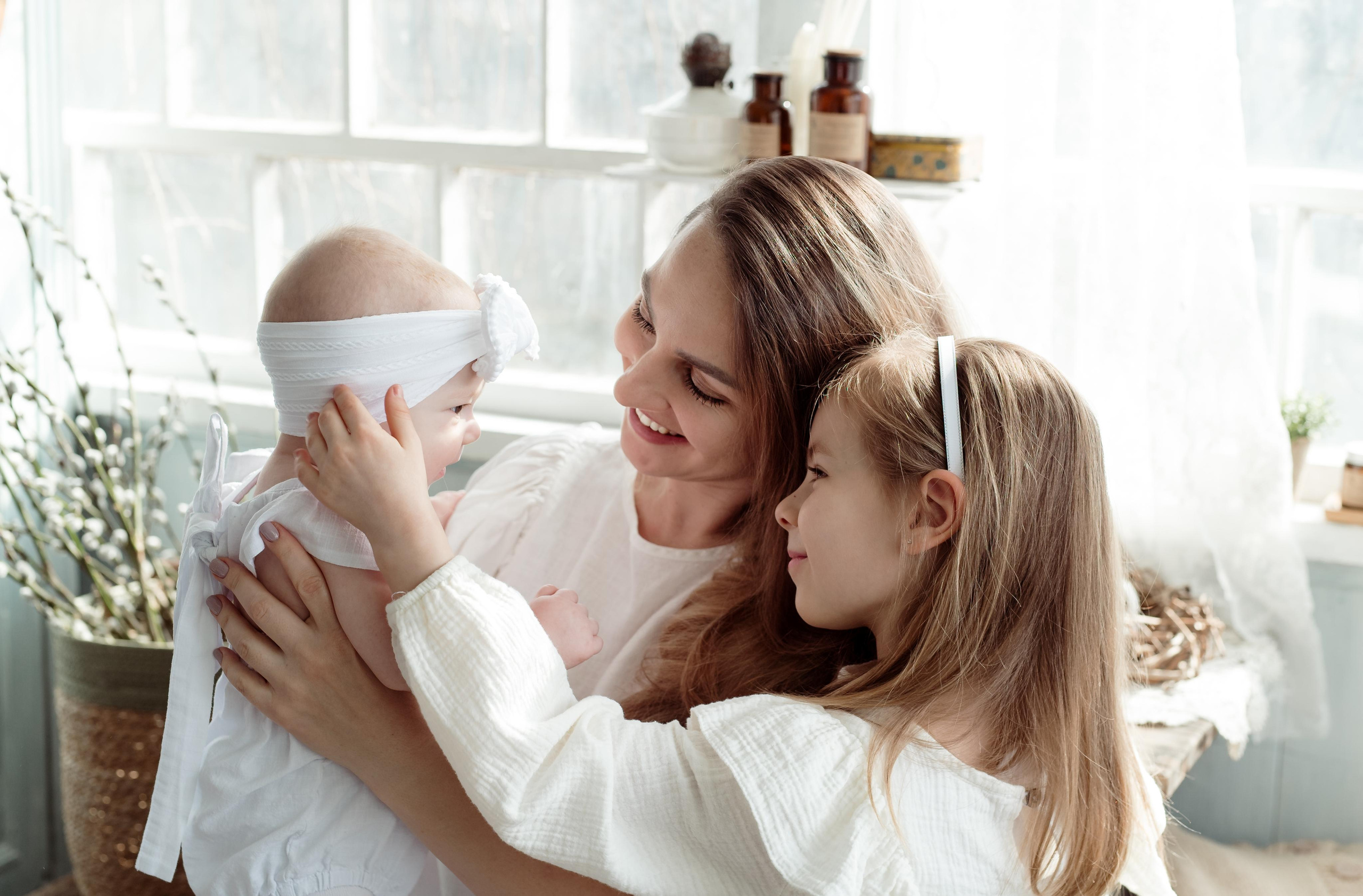Mother with daughters. Family and content photographer