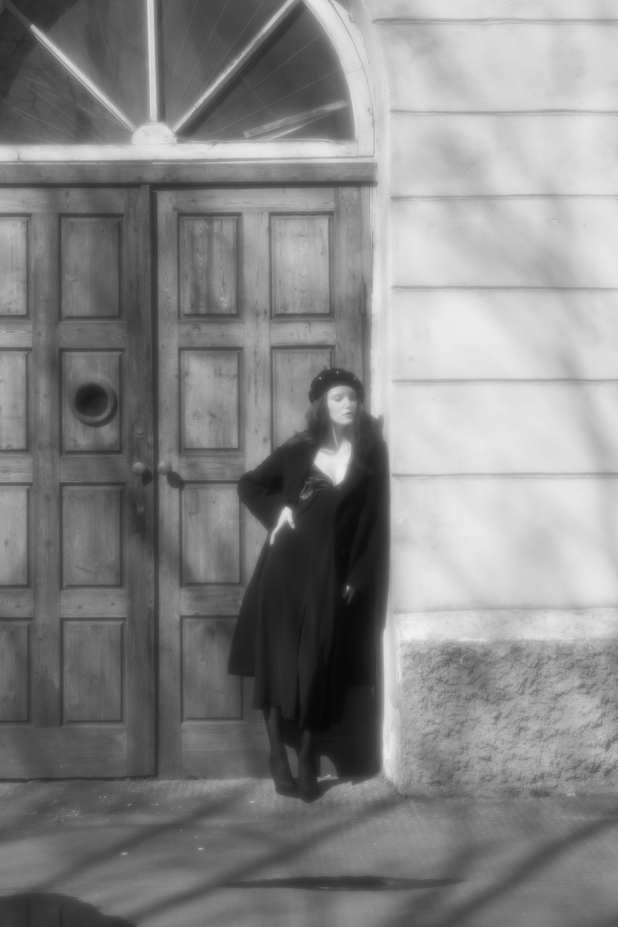 Black coat walking. Fashion Photographer Oxana Chernomorets