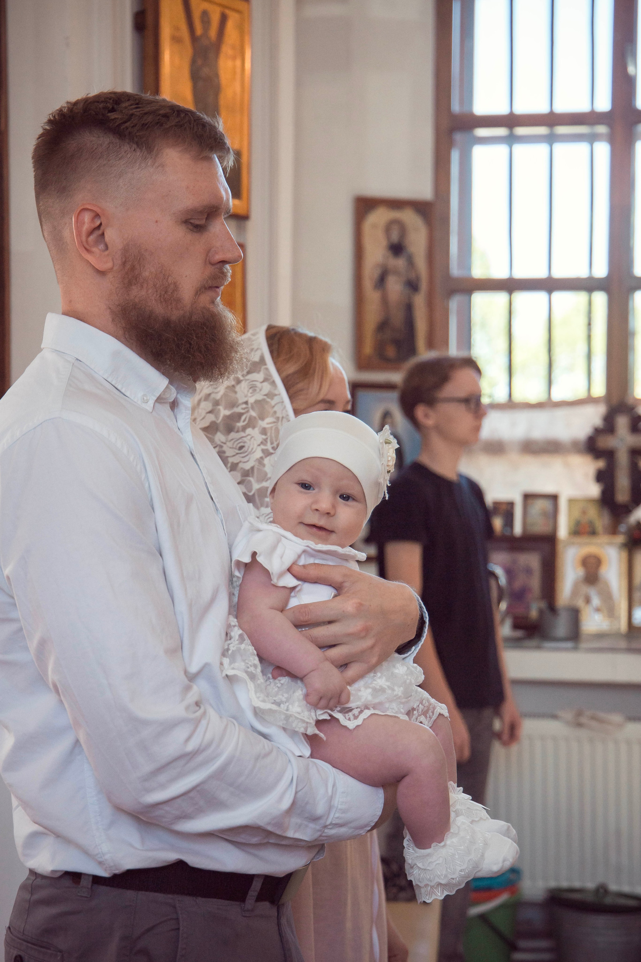 крещение маленькой девочки. Фотограф Юлия Щедрина