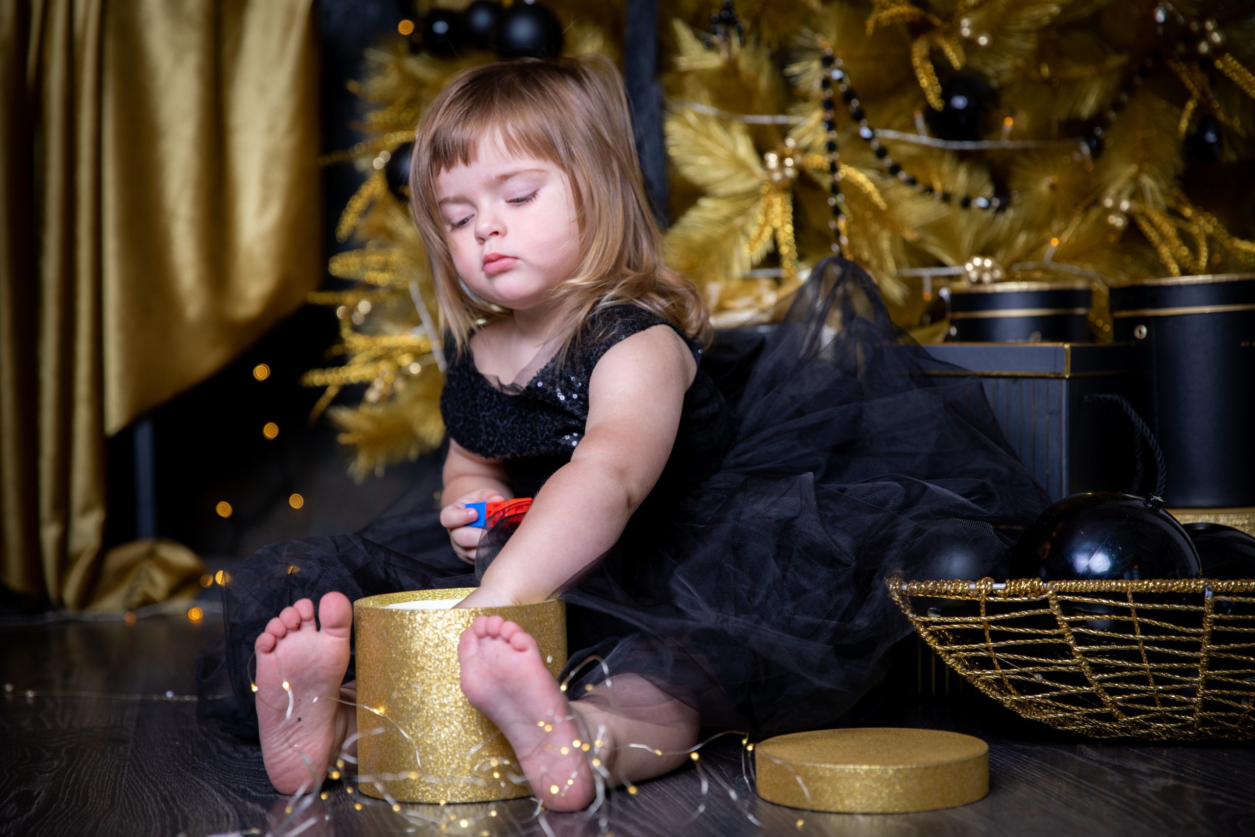 A child at a family photo shoot in the studio