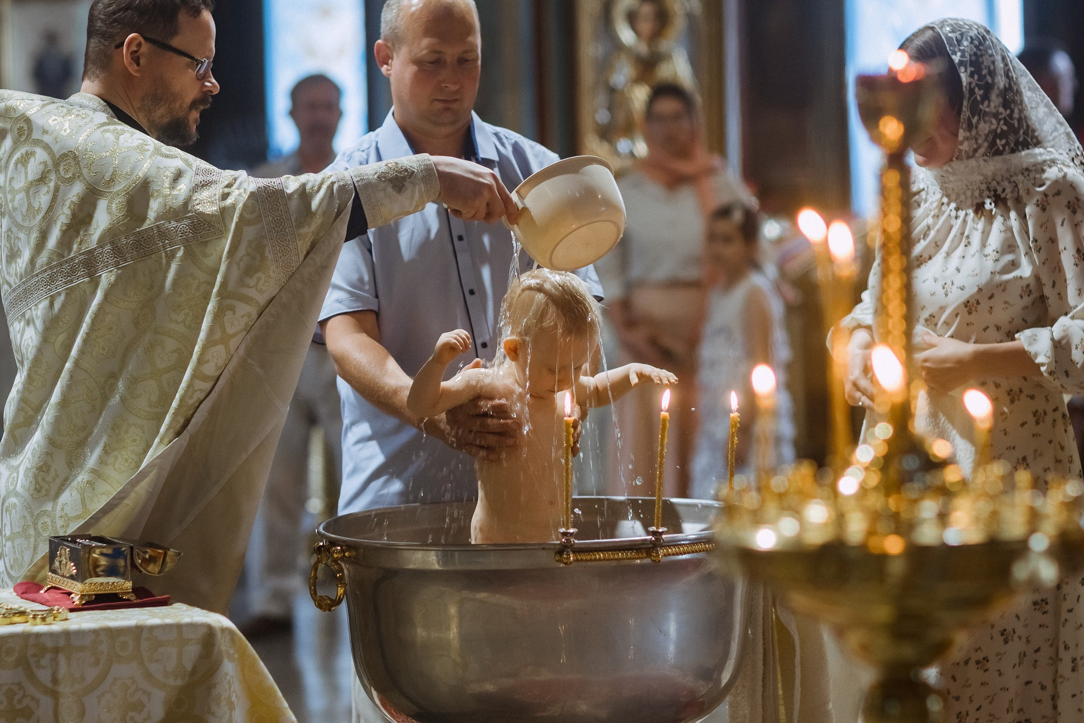 Таинство крещения. Фотографы в городе Волгограде — Людмила Агеева и Алексей Околелов