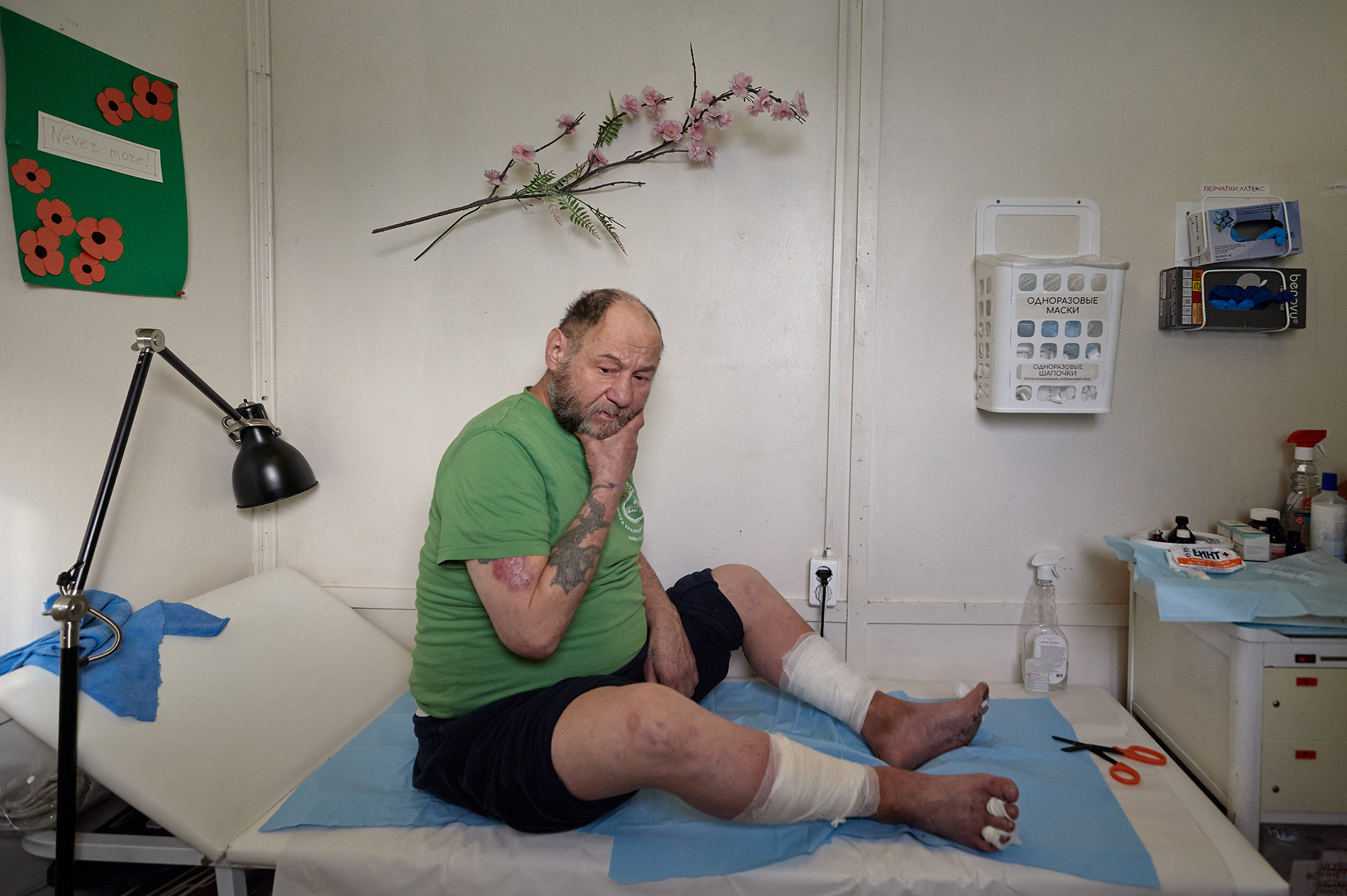 A homeless man in the medical office of the Maltese Shelter for the Homeless. St. Petersburg, March 4, 2023.