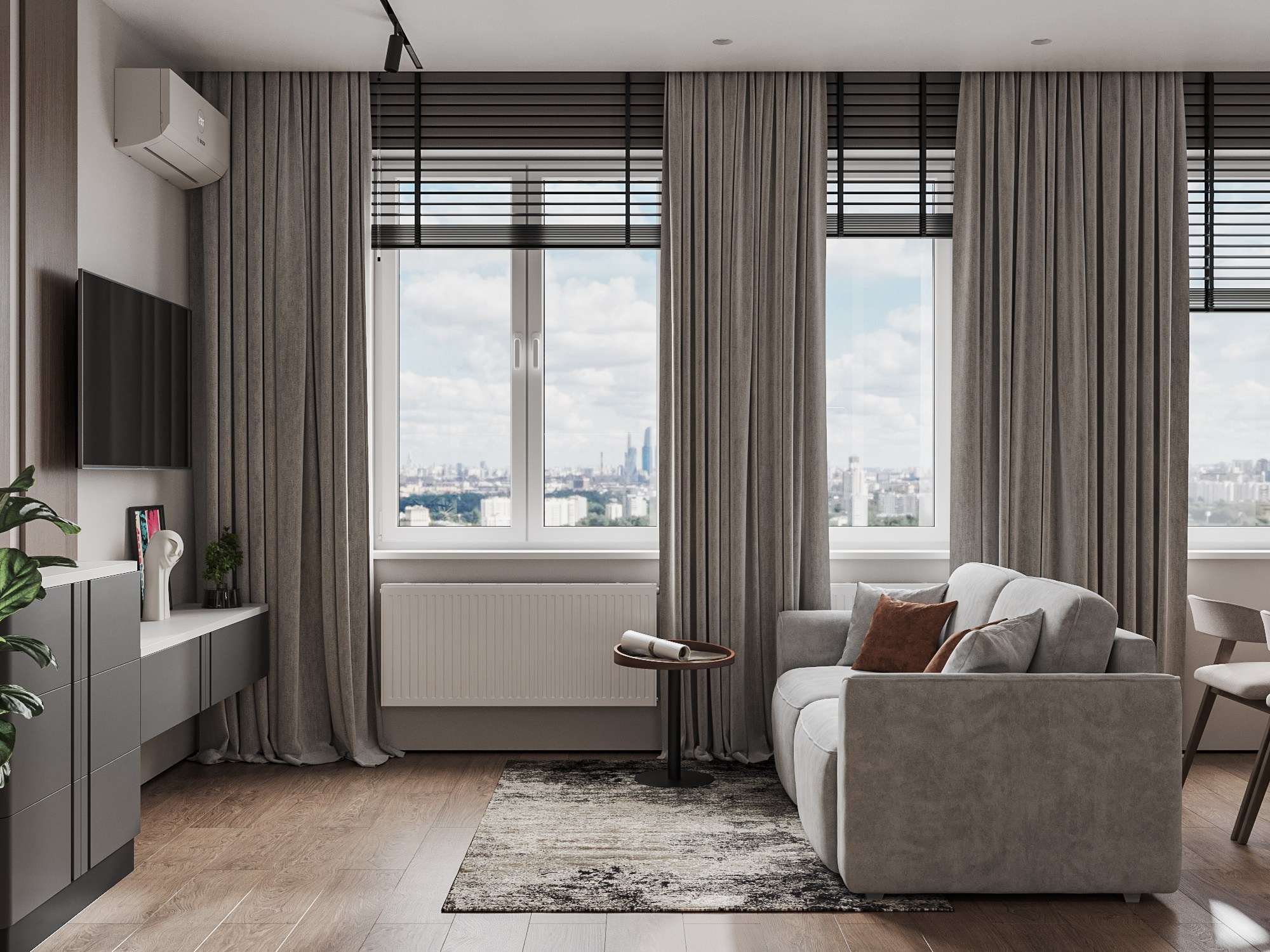 Интерьер небольшой студии с кухней-гостиной, оформленной в современном дизайне