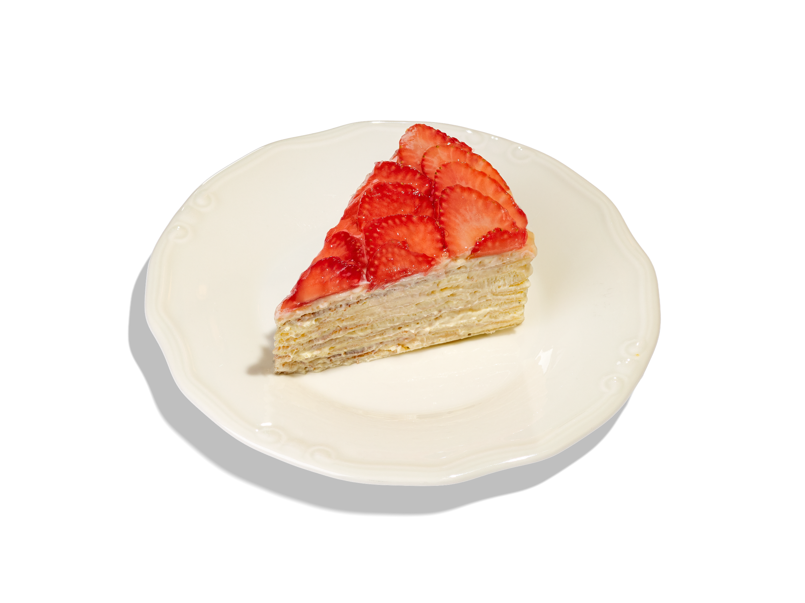 ЯПОНСКИЙ БЛИННЫЙ ТОРТ 590₽. Тонкие блины, приготовленные из рисовой муки, яиц, сахара и сливочного масла, Пропитываются  кремом  из сыра  маскарпоне с добавлением ванильной пасты, желтков и сливок. Торт украшается  свежими ягодами клубники, политыми нейтральным кондитерским гелем.