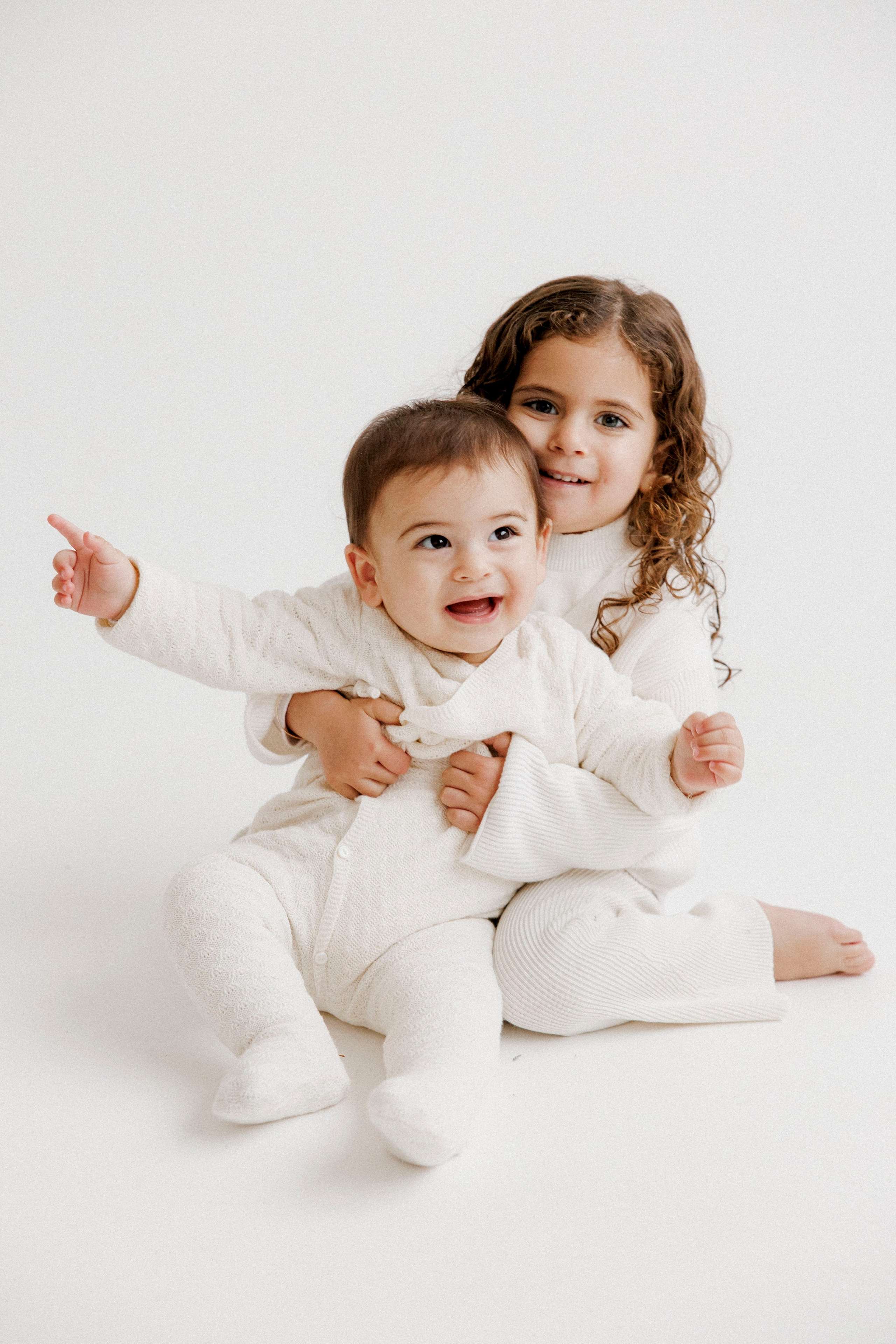 Family photoshoot in White Studio. Wedding and family photographer