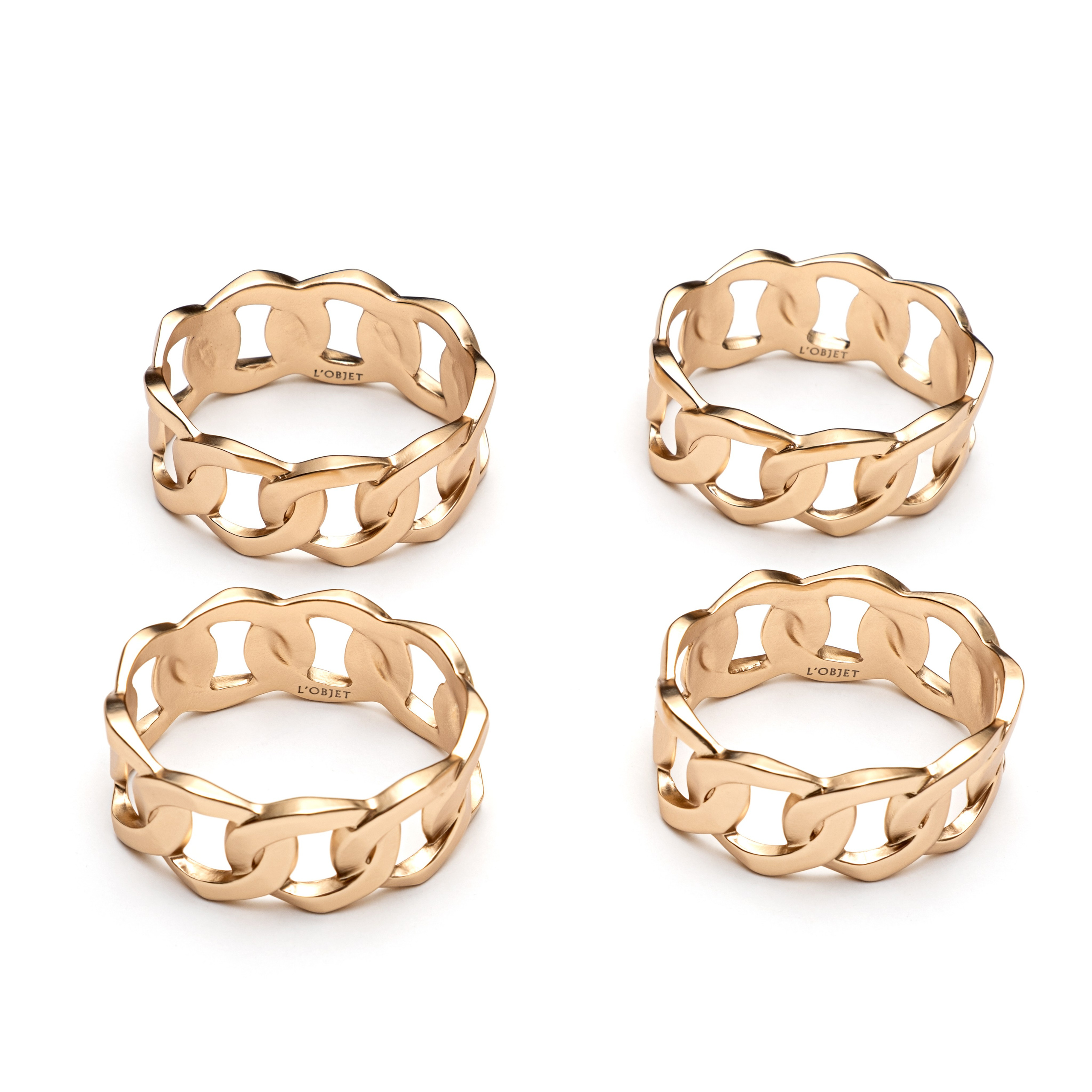 Каталожная предметная съемка набора металлических салфетниц на белом фоне