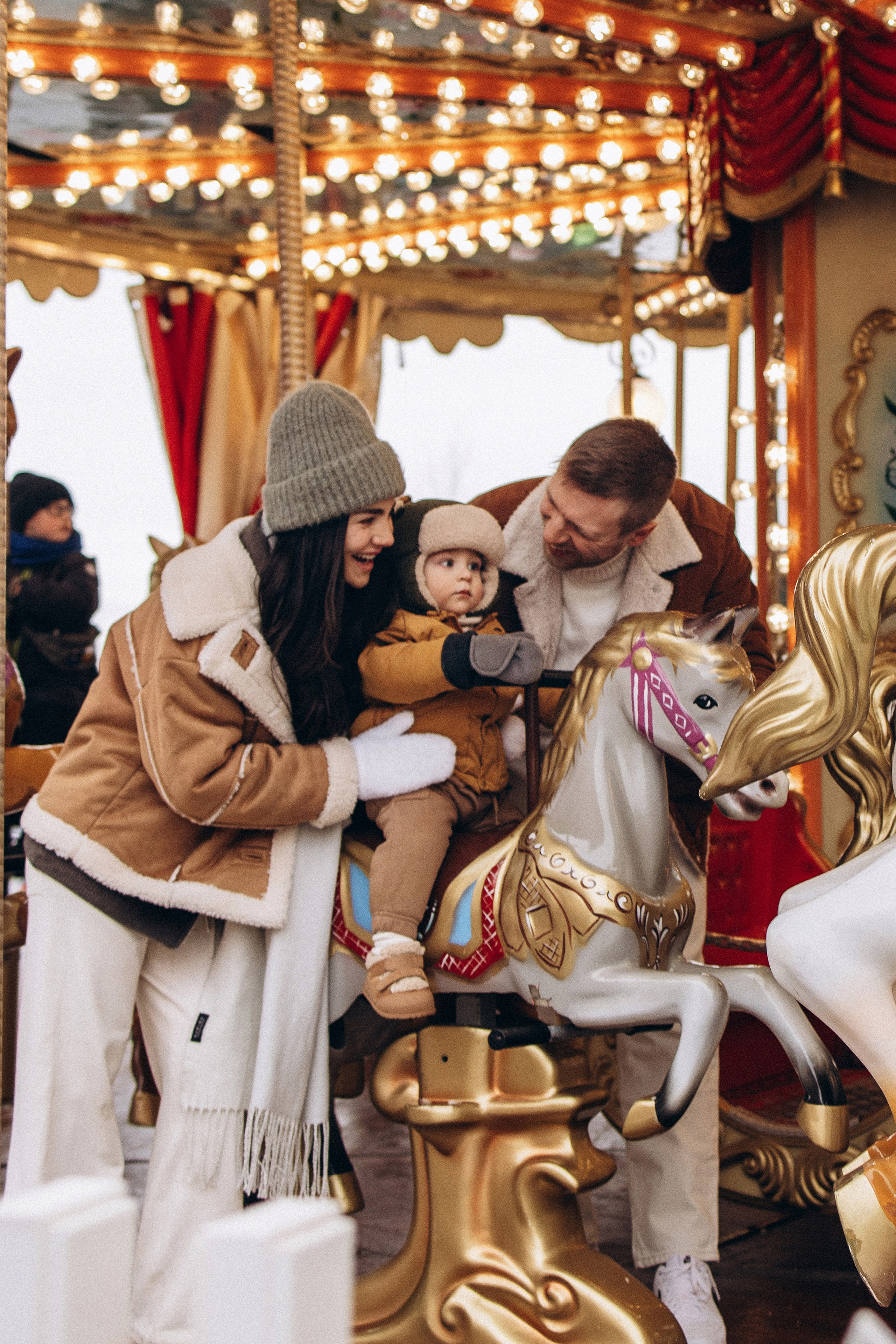 Марьям, Михаил и Лев на Рождественской ярмарке. Семейный фотограф в Москве Марина Петра