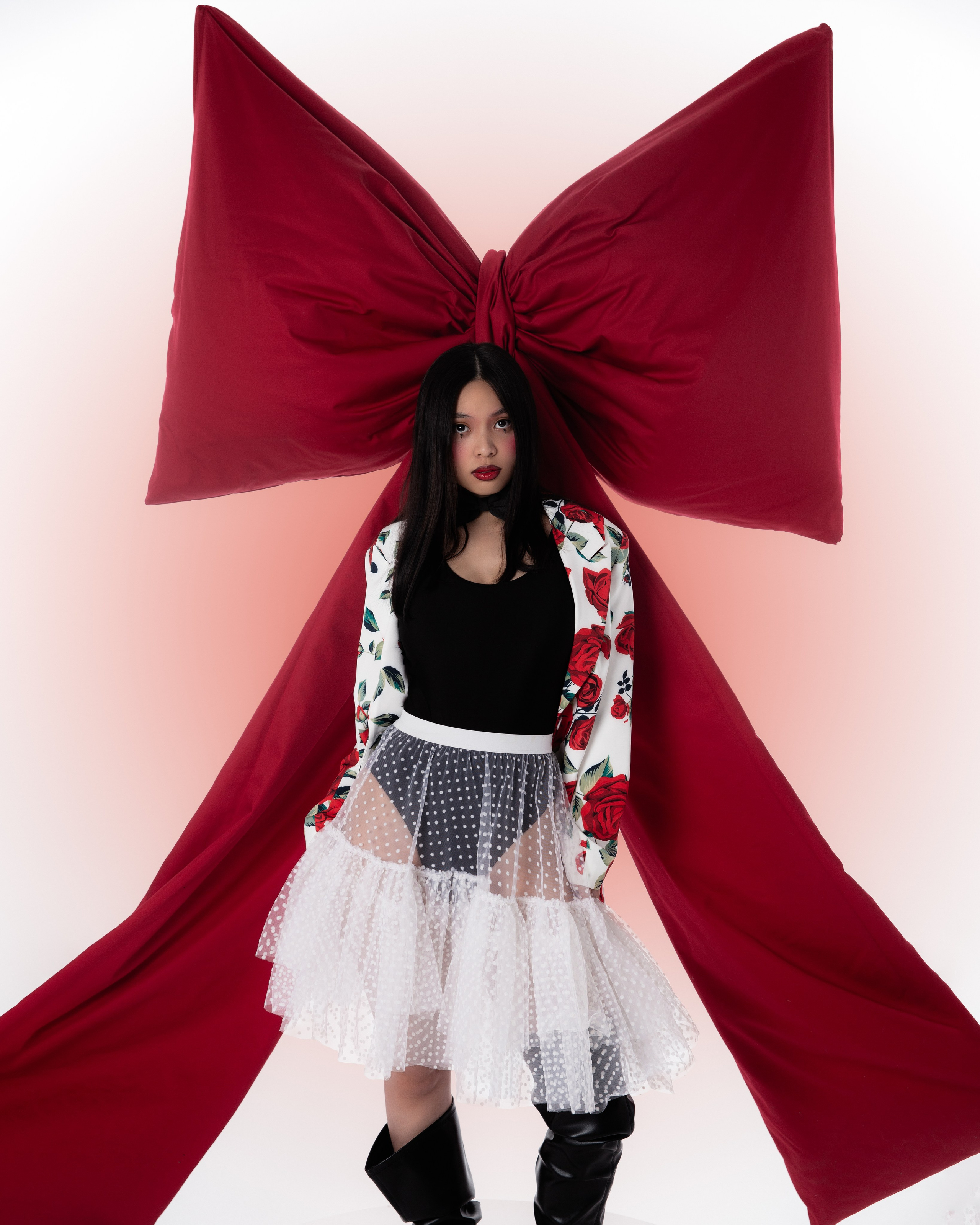 Bow. Photographer. Producer. Retoucher