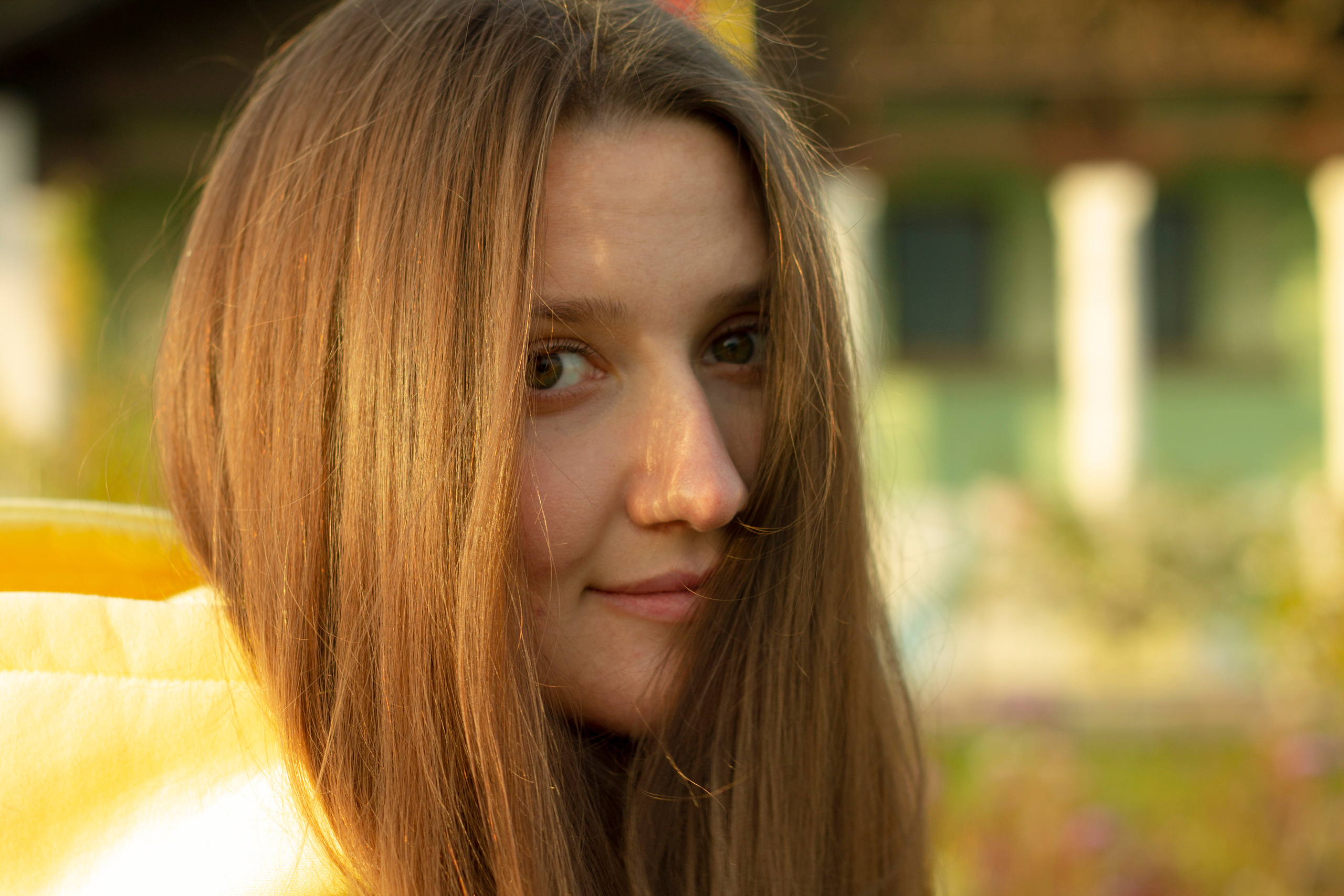 Yellow portrait of woman with a lot of hair