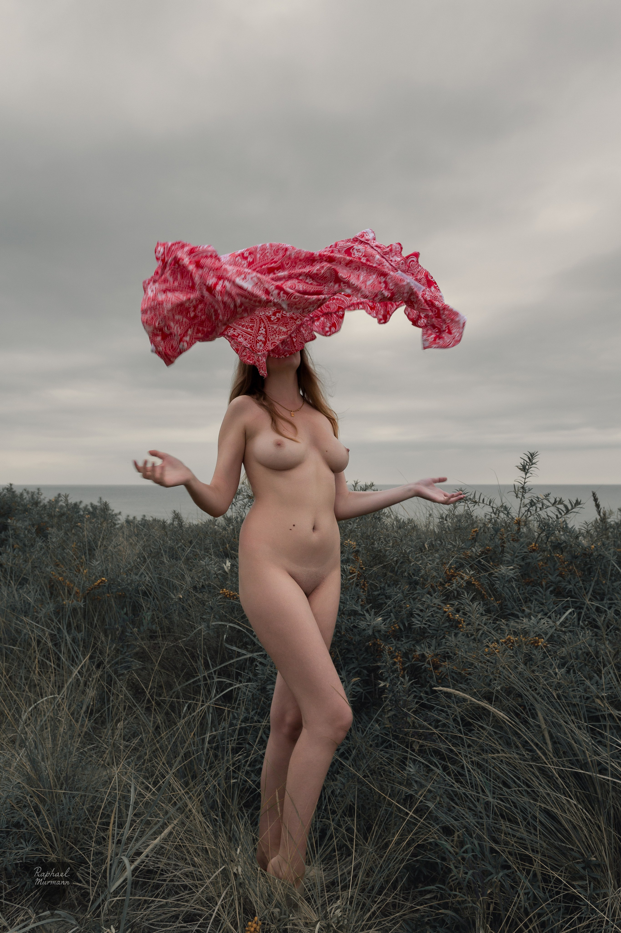 nude woman red fabric conceptual photography expressive style