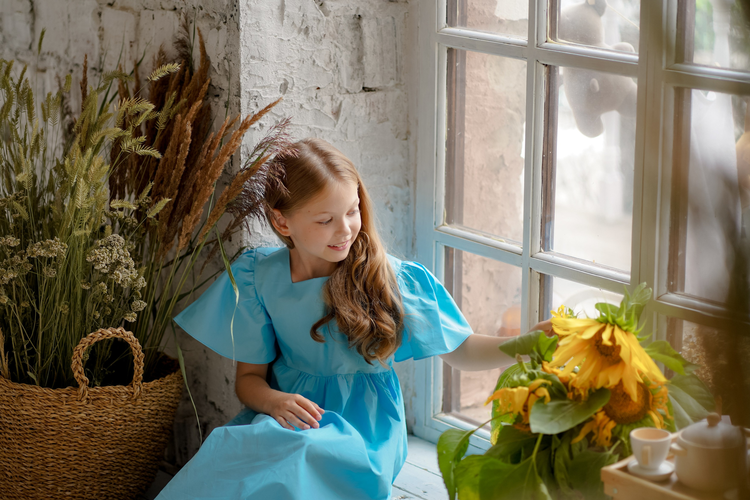 Кира с подсолнухами. Фотограф Татьяна Митрофанова