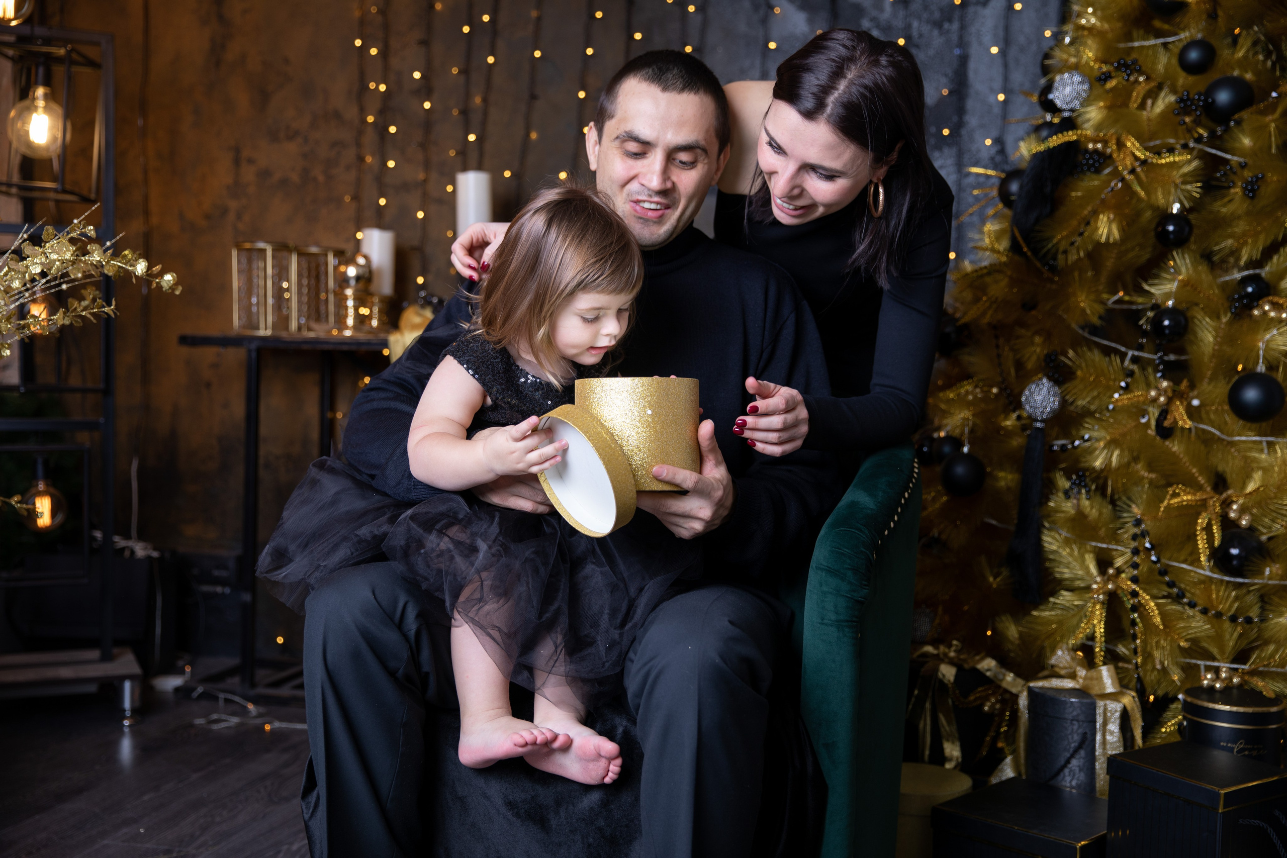 Family at a Christmas photo shoot in a studio