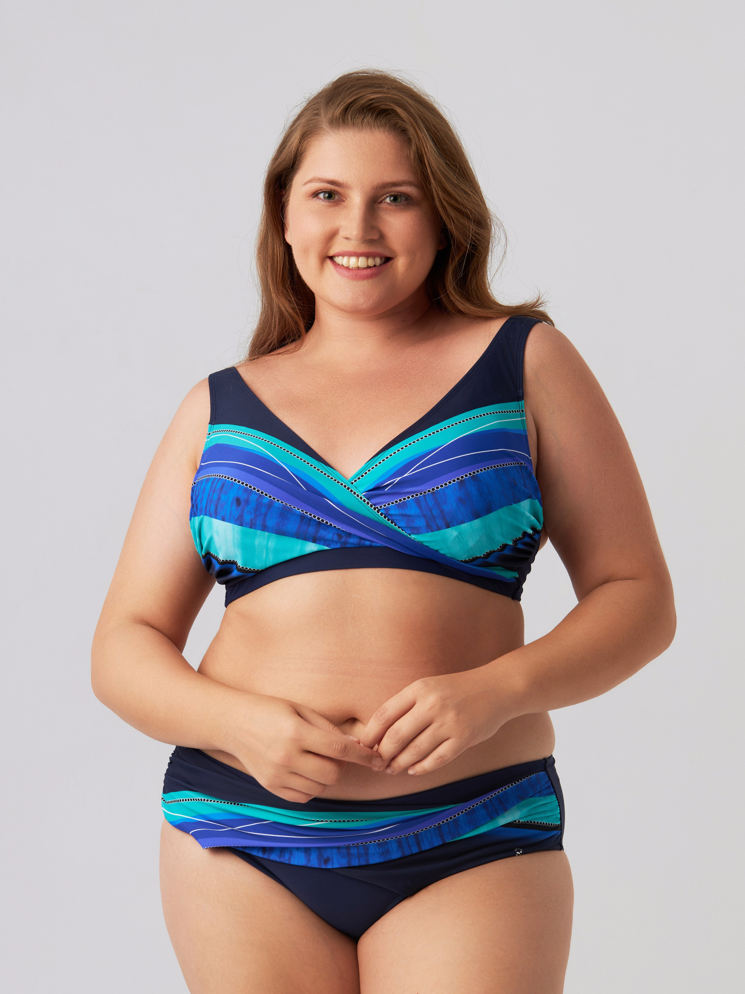 Фотосъёмка купальника на модели плюс сайз