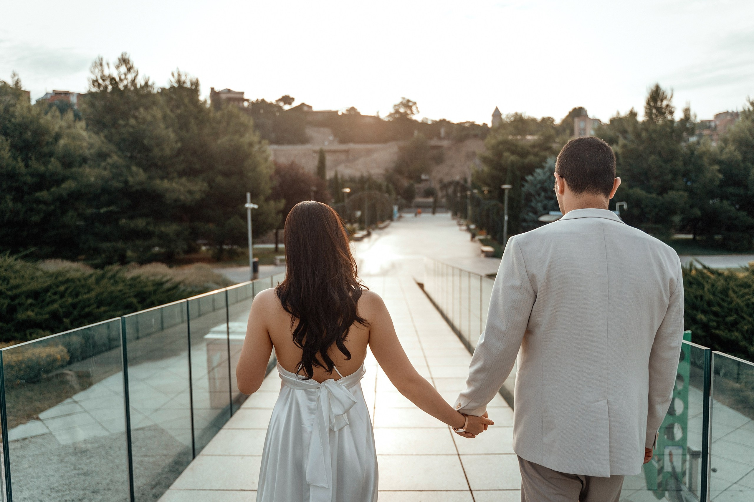 Alaeddine & Matika on the Peace Bridge in Tbilisi. Photographer Sergey Otkrytyi in Batumi & Tbilisi