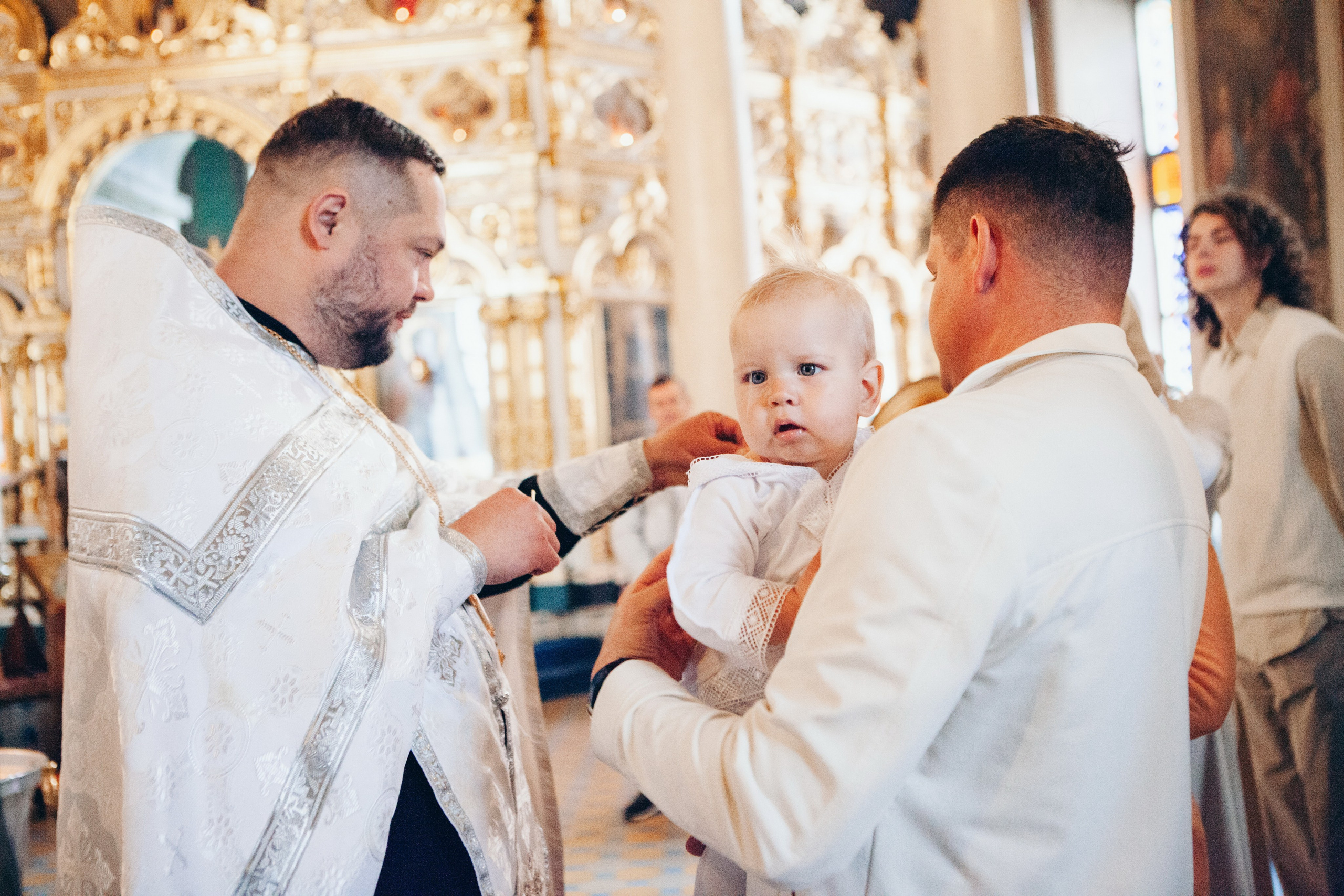 Крещение ребенка в церкви. Фотограф Ольга Ефремова
