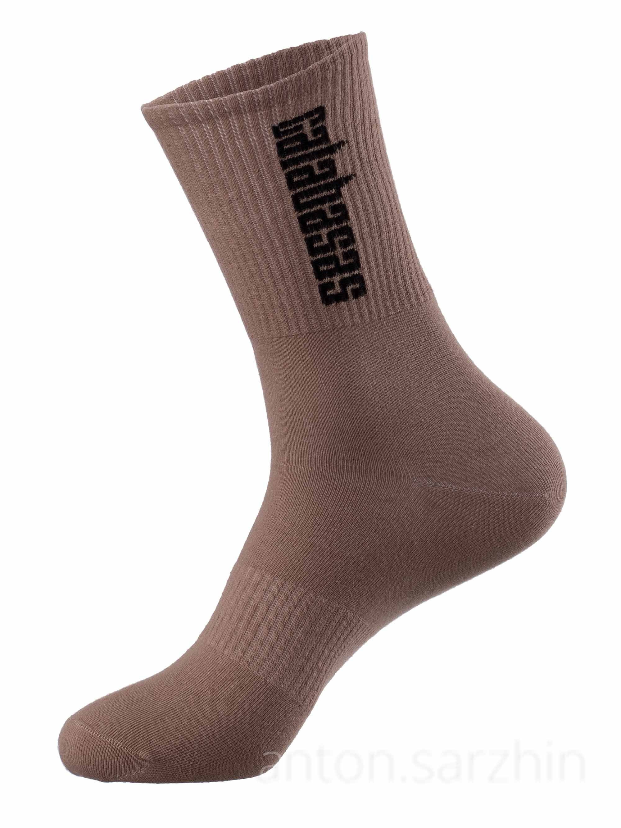 Фото носка на манекене на белом фоне