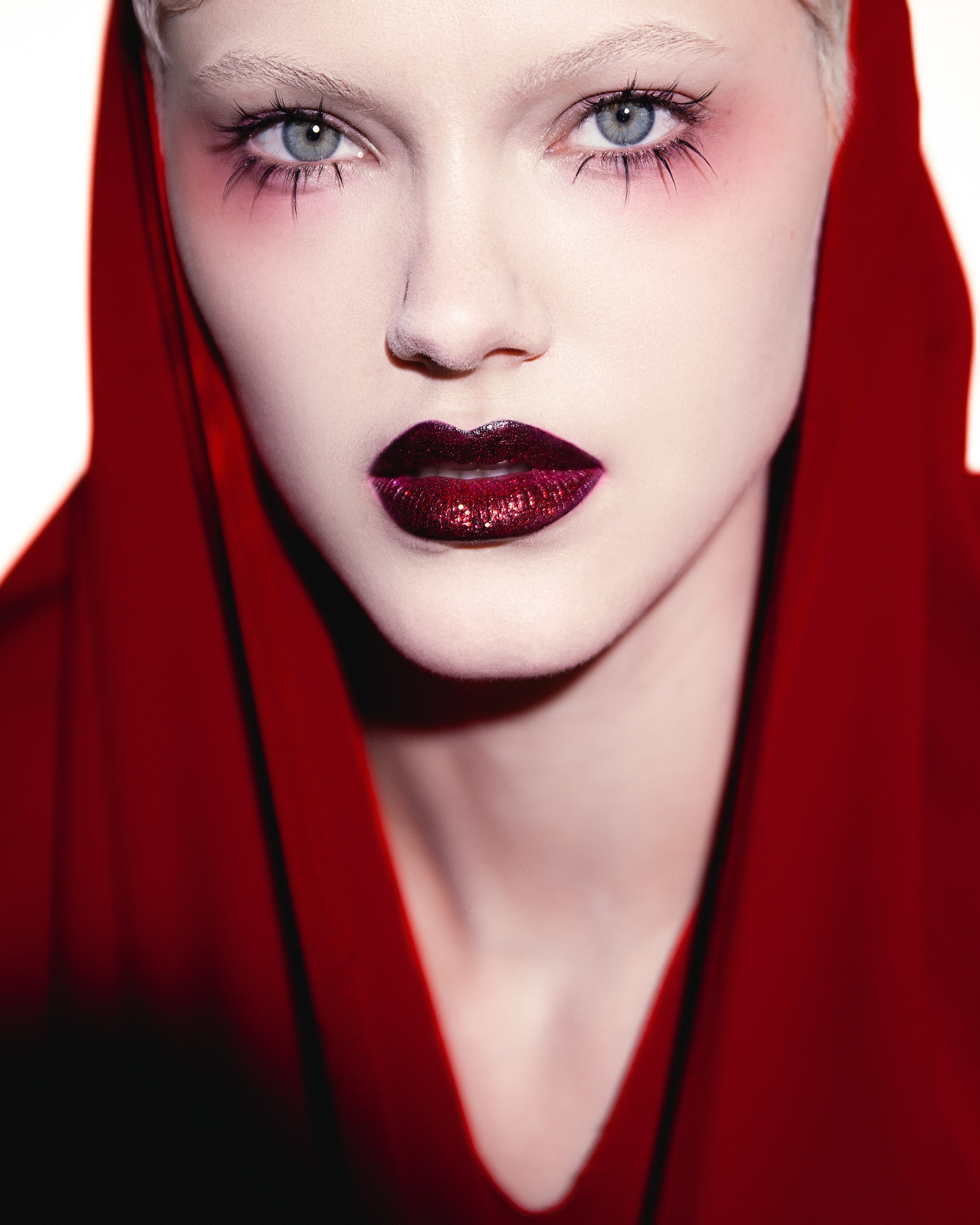 Red. Photographer. Producer. Retoucher