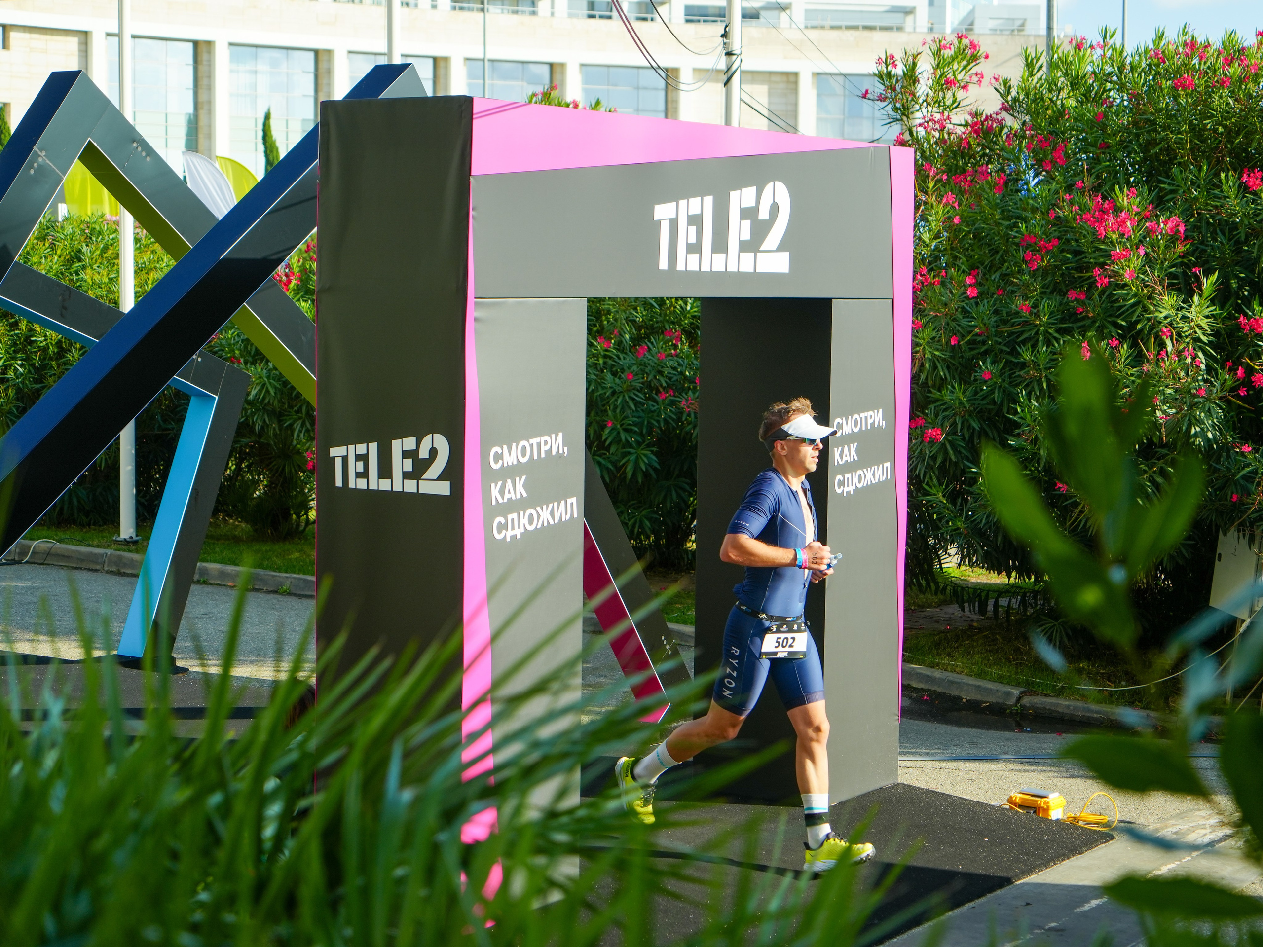 Фотоотчет партнерской интеграции для компании TELE2 на фестивале Ironstar. Репортажный фотограф в Красной Поляне и Сочи Павлюченко Екатерина