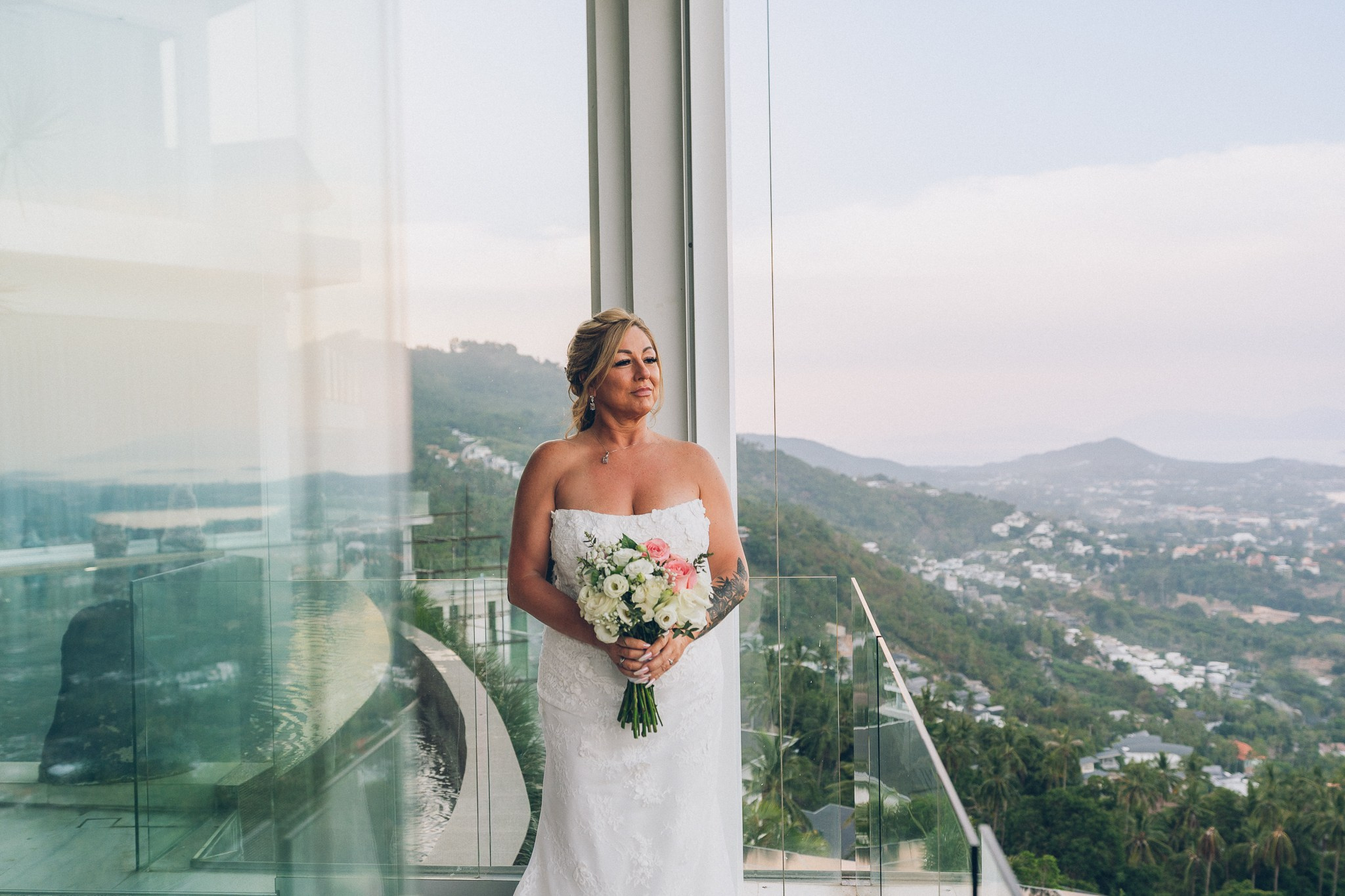 Bride and groom celebrating a sunset wedding at a villa in Koh Samui