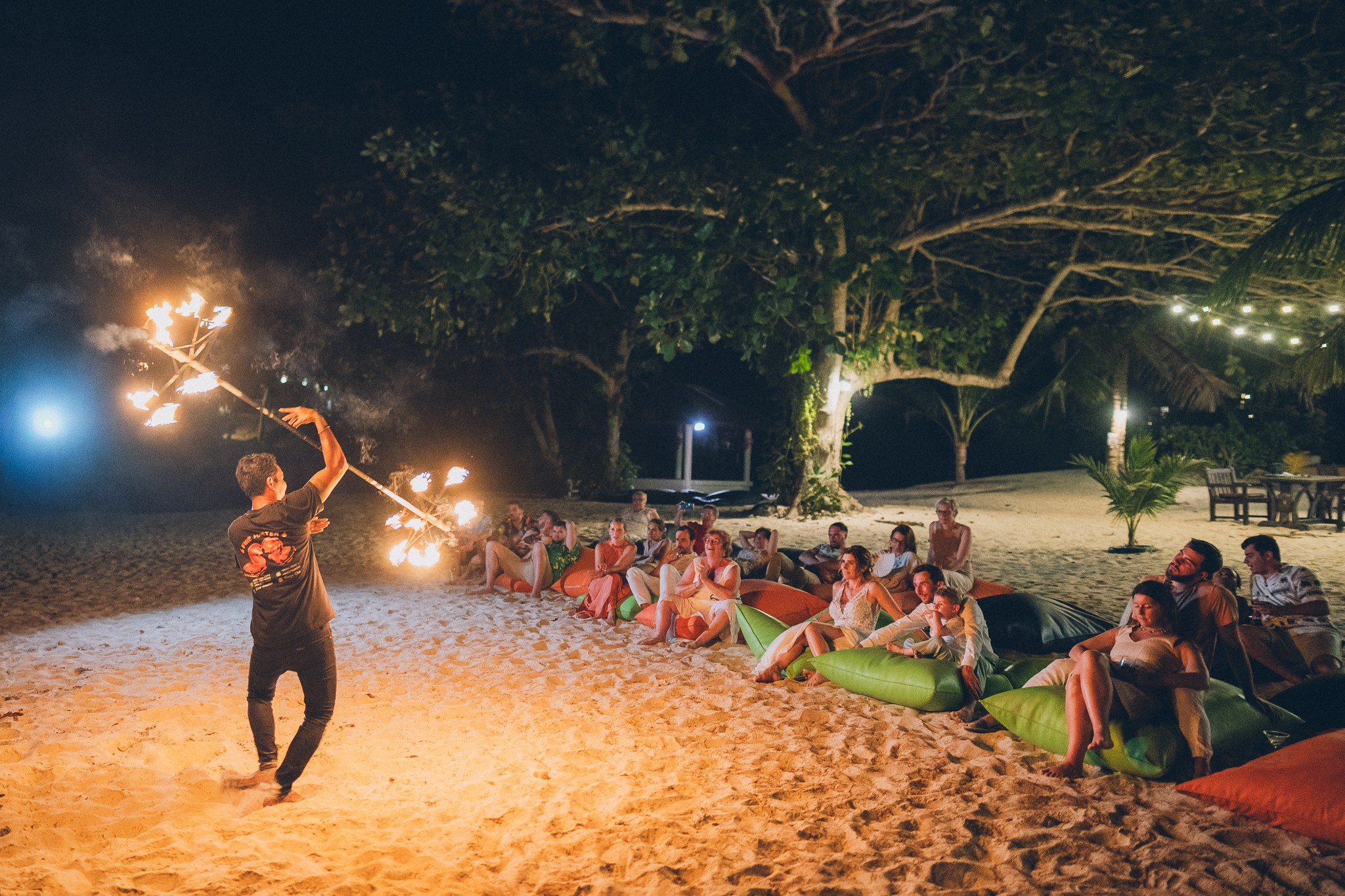 Professional fire dancers performing at a luxury wedding in Thailand