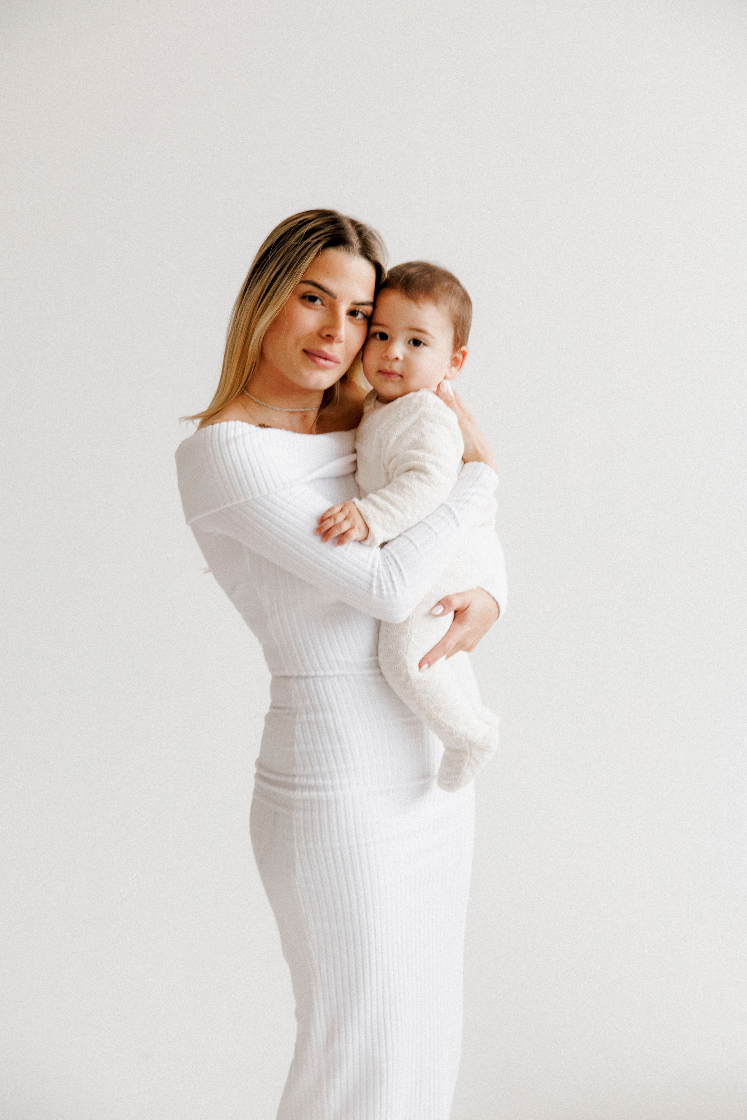 Family photoshoot in White Studio. Wedding and family photographer
