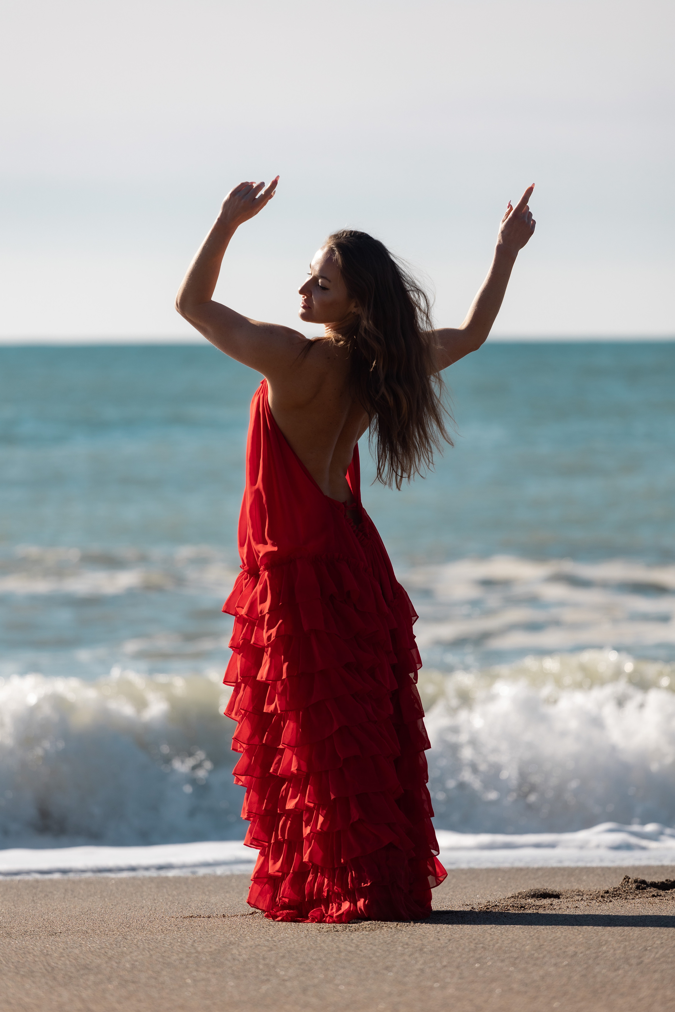 Shooting in a red dress in the sea. Photographer in Saint-Petersburg and Moscow Max Spector