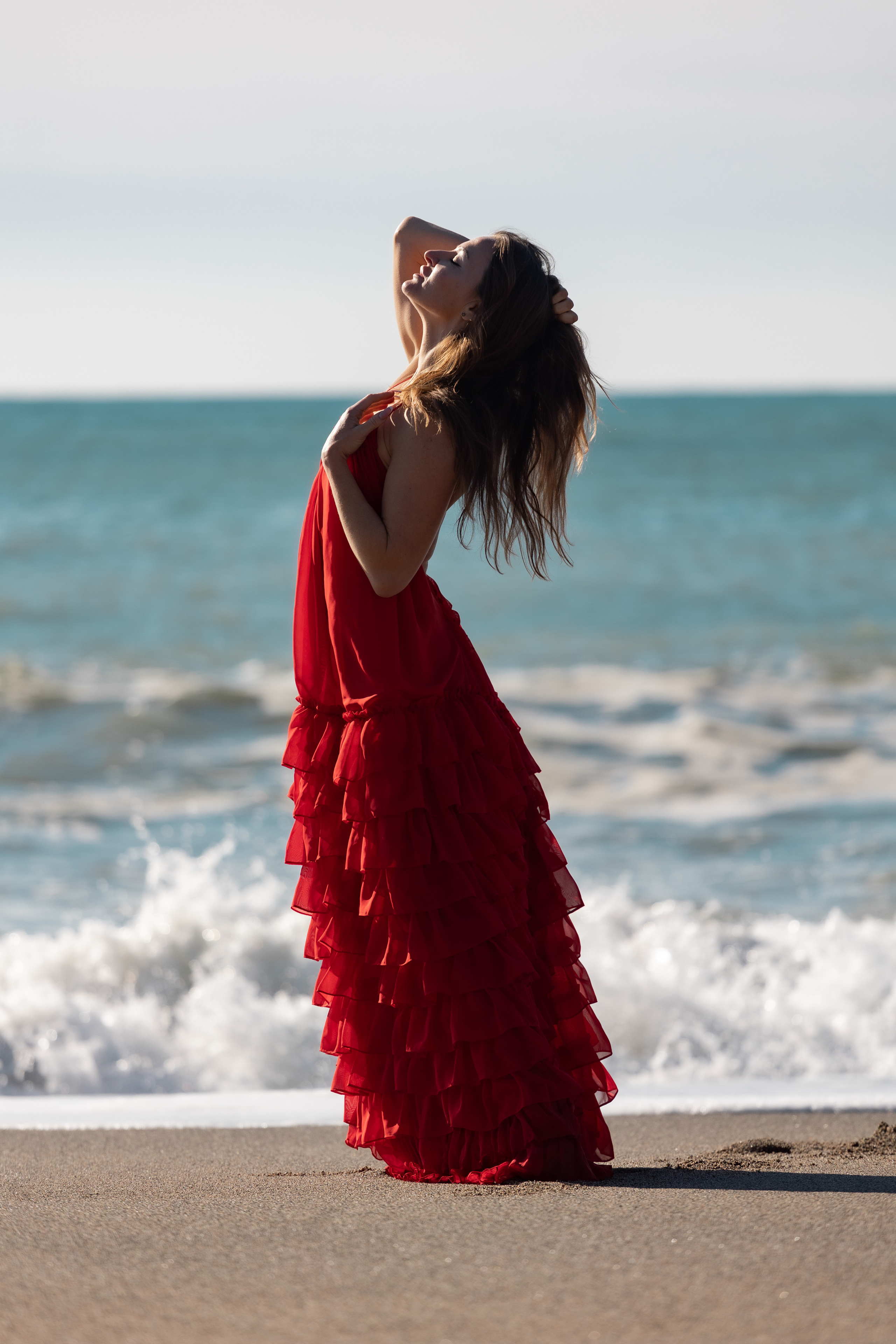 Shooting in a red dress in the sea. Photographer in Saint-Petersburg and Moscow Max Spector