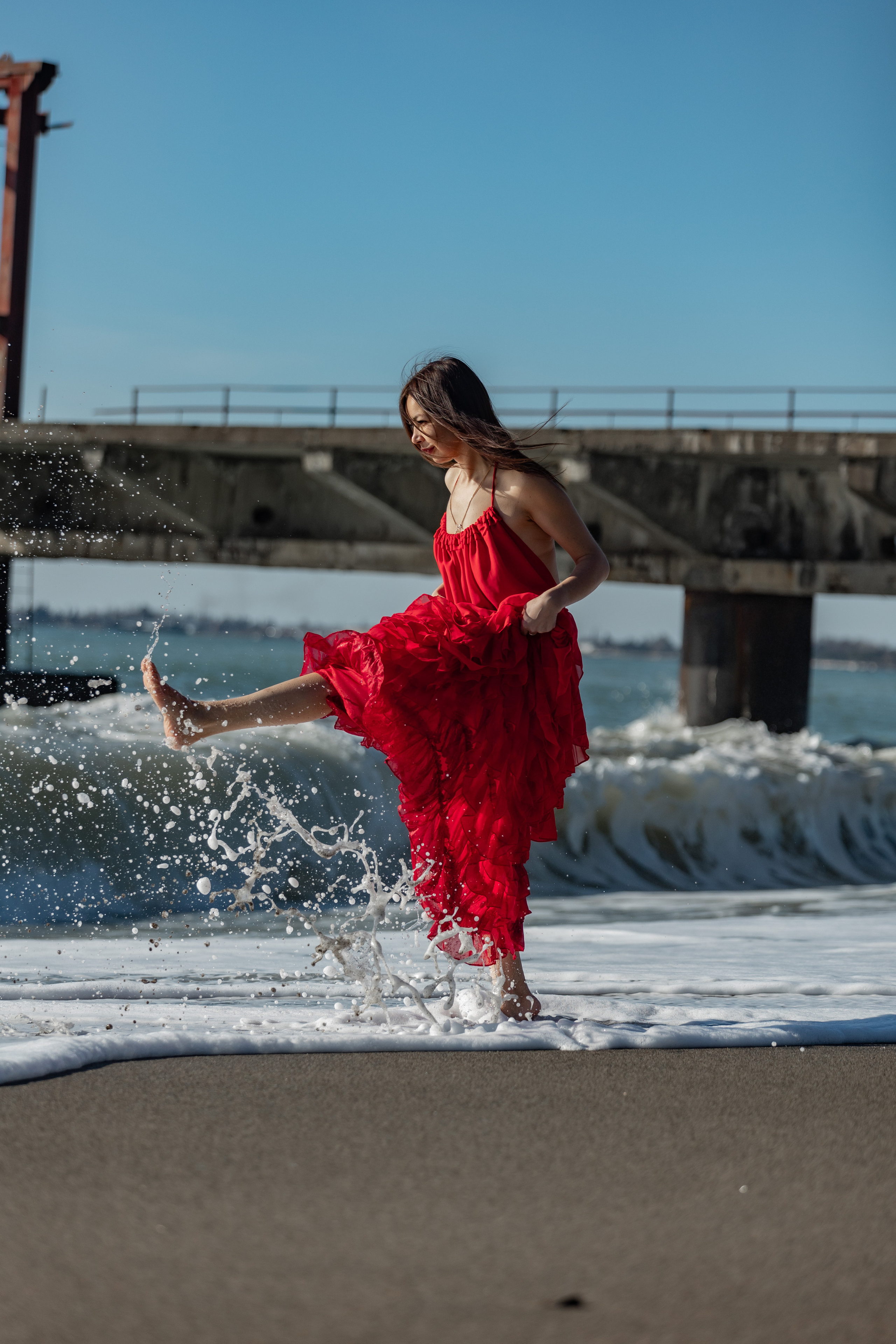 Shooting in a red dress in the sea. Photographer in Saint-Petersburg and Moscow Max Spector