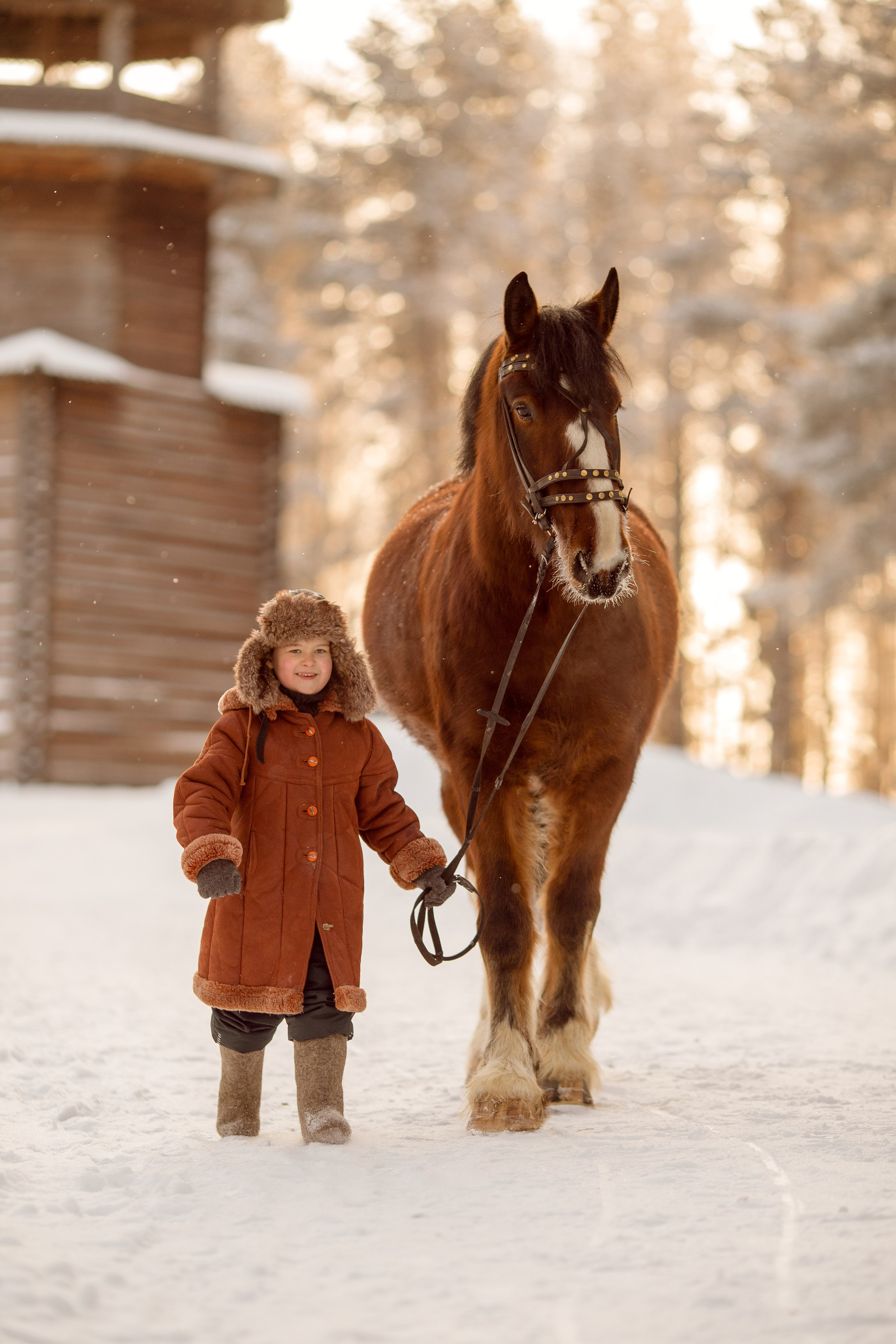 Детская фотосессия с лошадью зимой