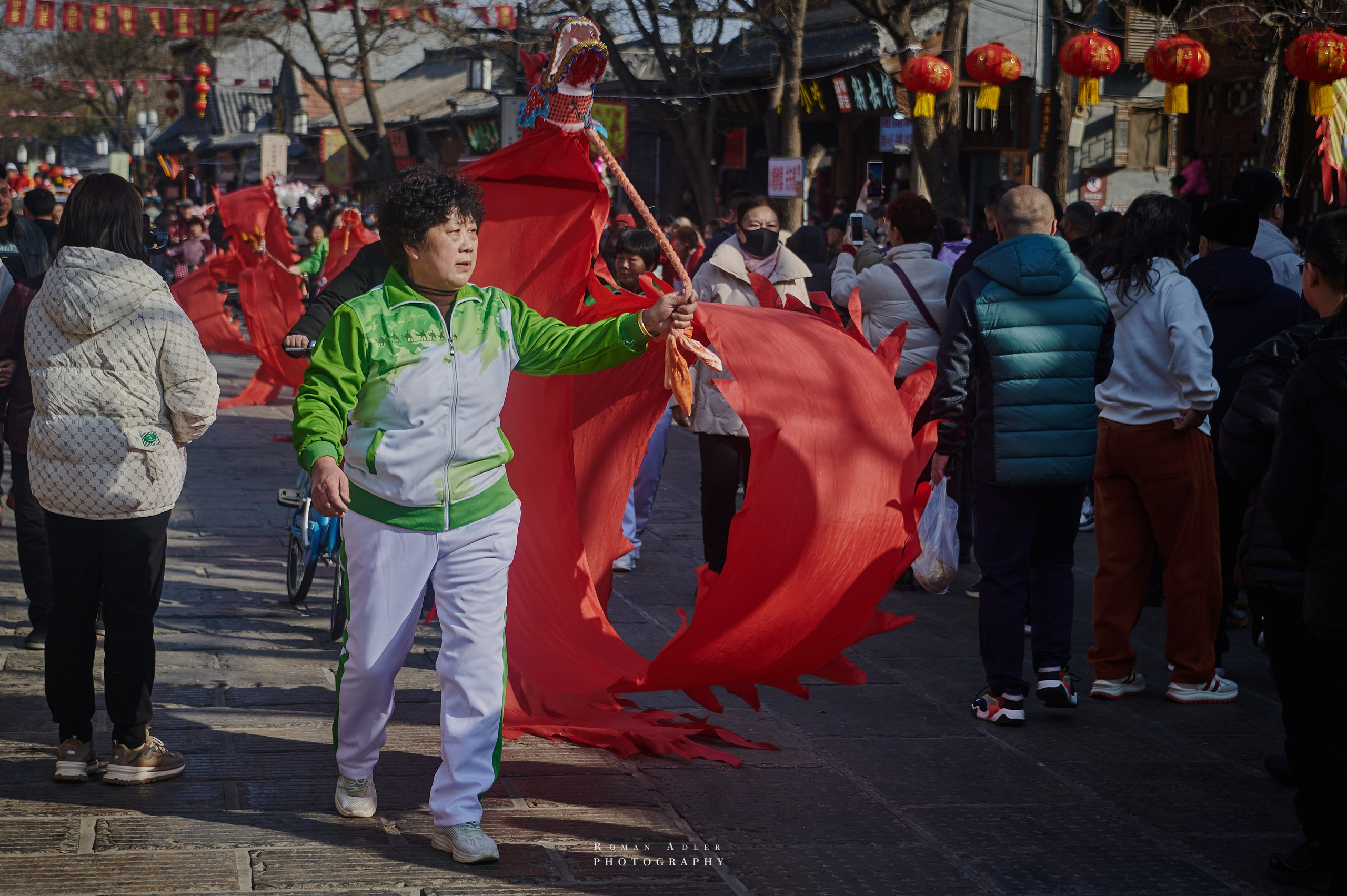 Новогодний парад в Цинчжоу. Китай. Фотограф Роман Адлер