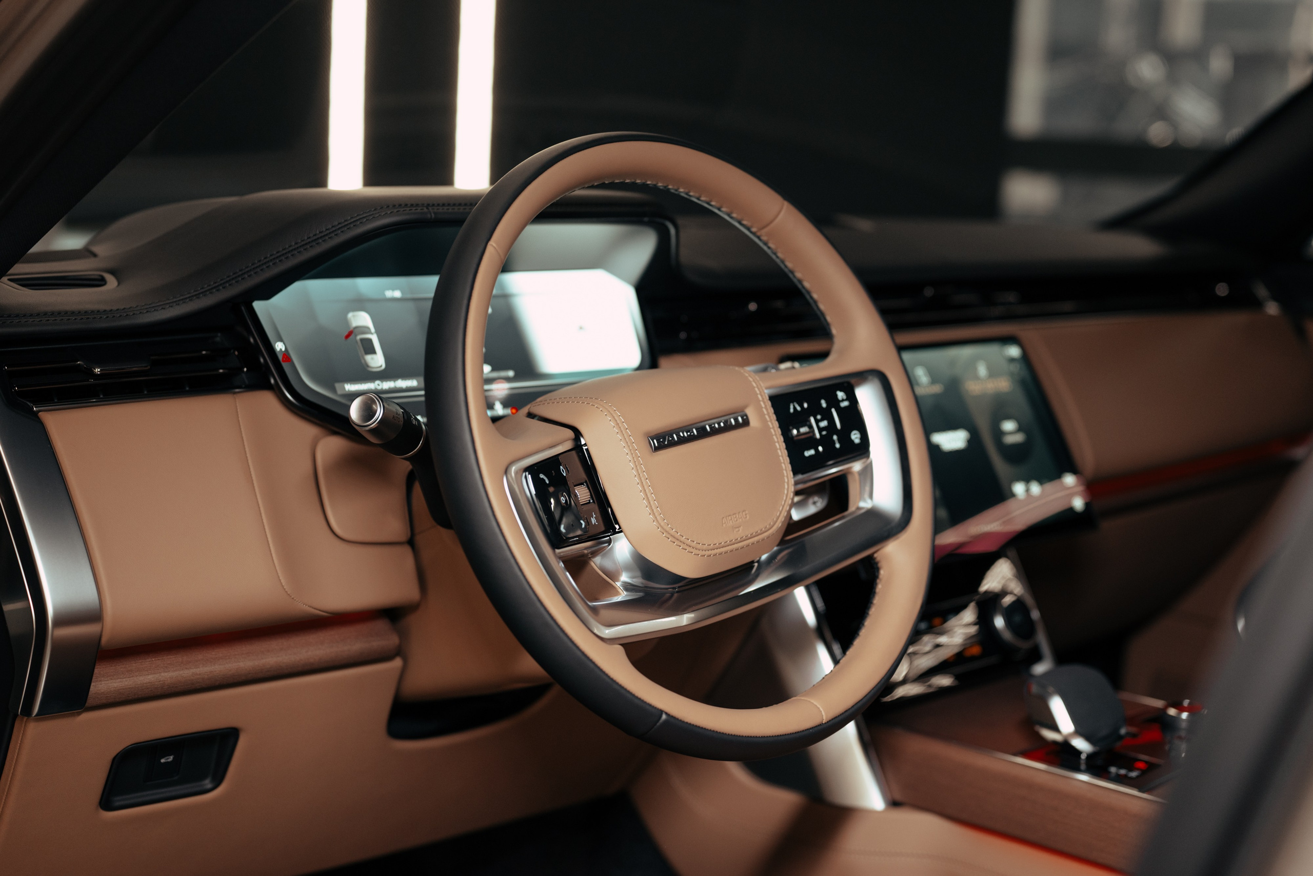 Range Rover gold on sand. DeLorein