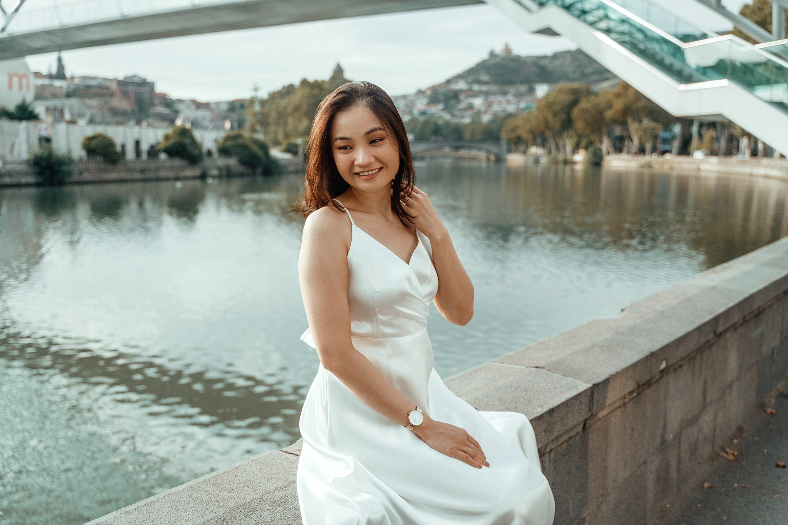 Alaeddine & Matika on the Peace Bridge in Tbilisi. Photographer Sergey Otkrytyi in Batumi & Tbilisi