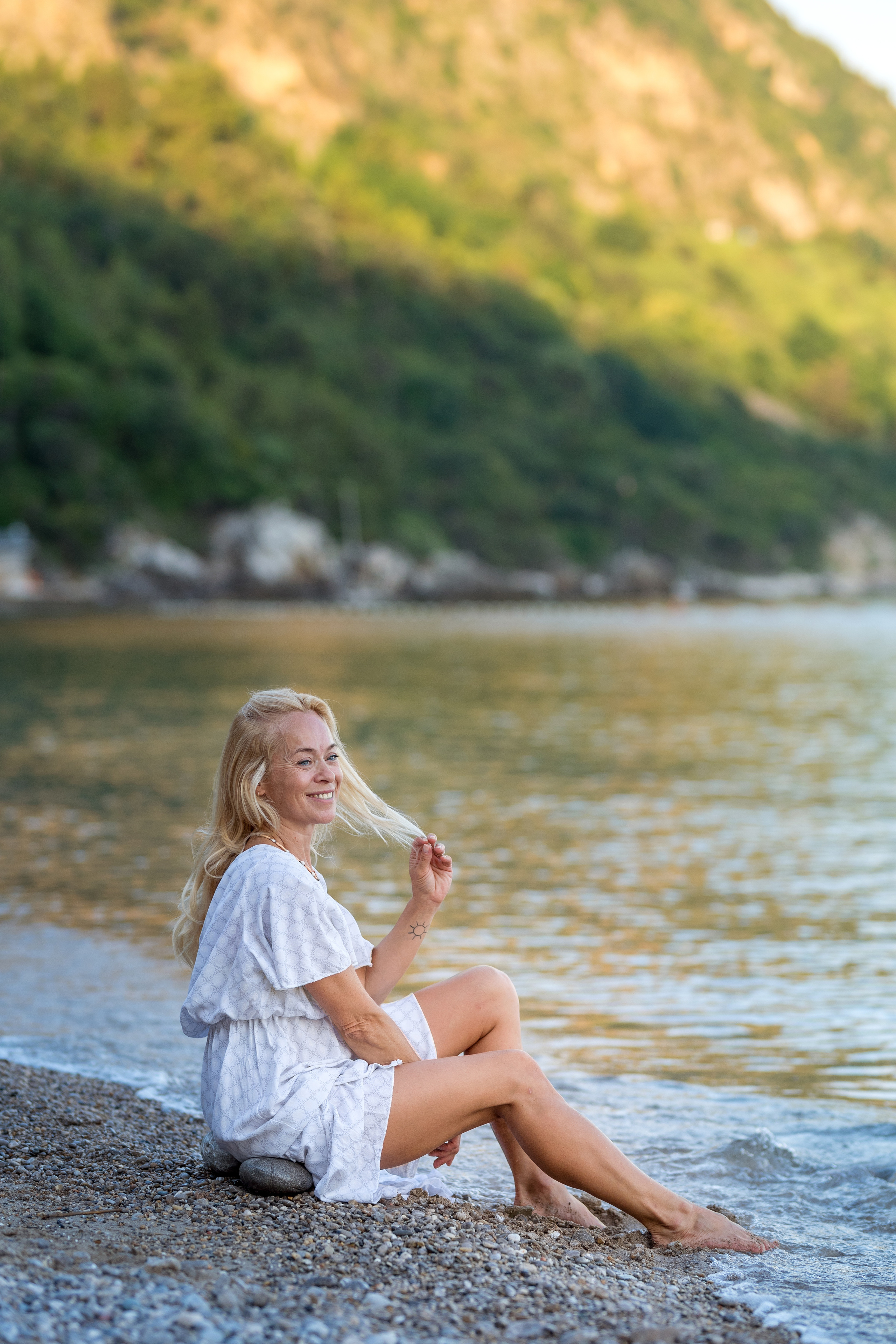Photo session of a mother and son on the beach in Budva, Montenegro. Kate Khaldeeva photographer in Saratov