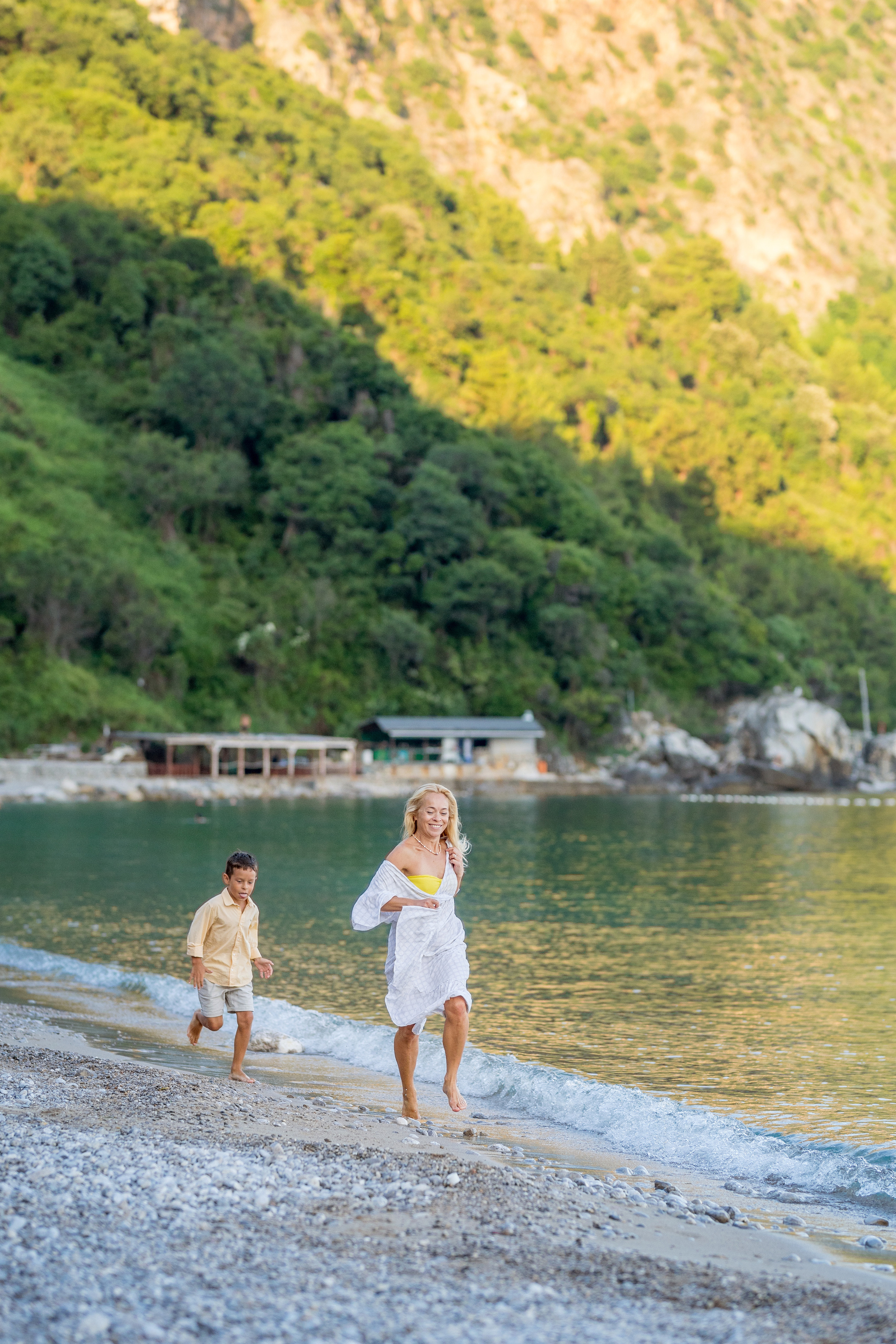Photo session of a mother and son on the beach in Budva, Montenegro. Kate Khaldeeva photographer in Saratov