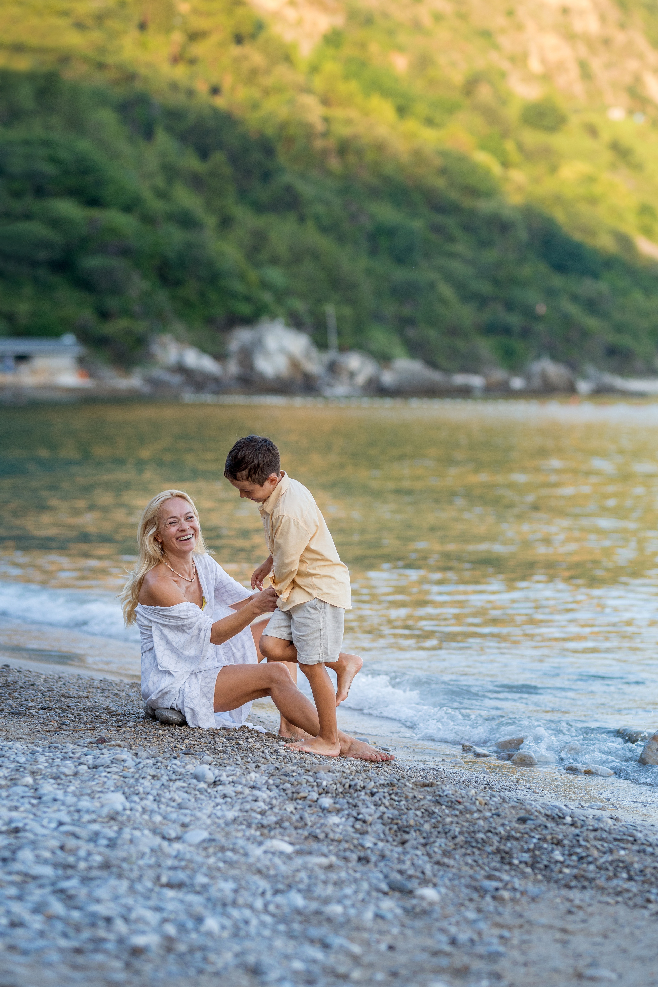 Photo session of a mother and son on the beach in Budva, Montenegro. Kate Khaldeeva photographer in Saratov