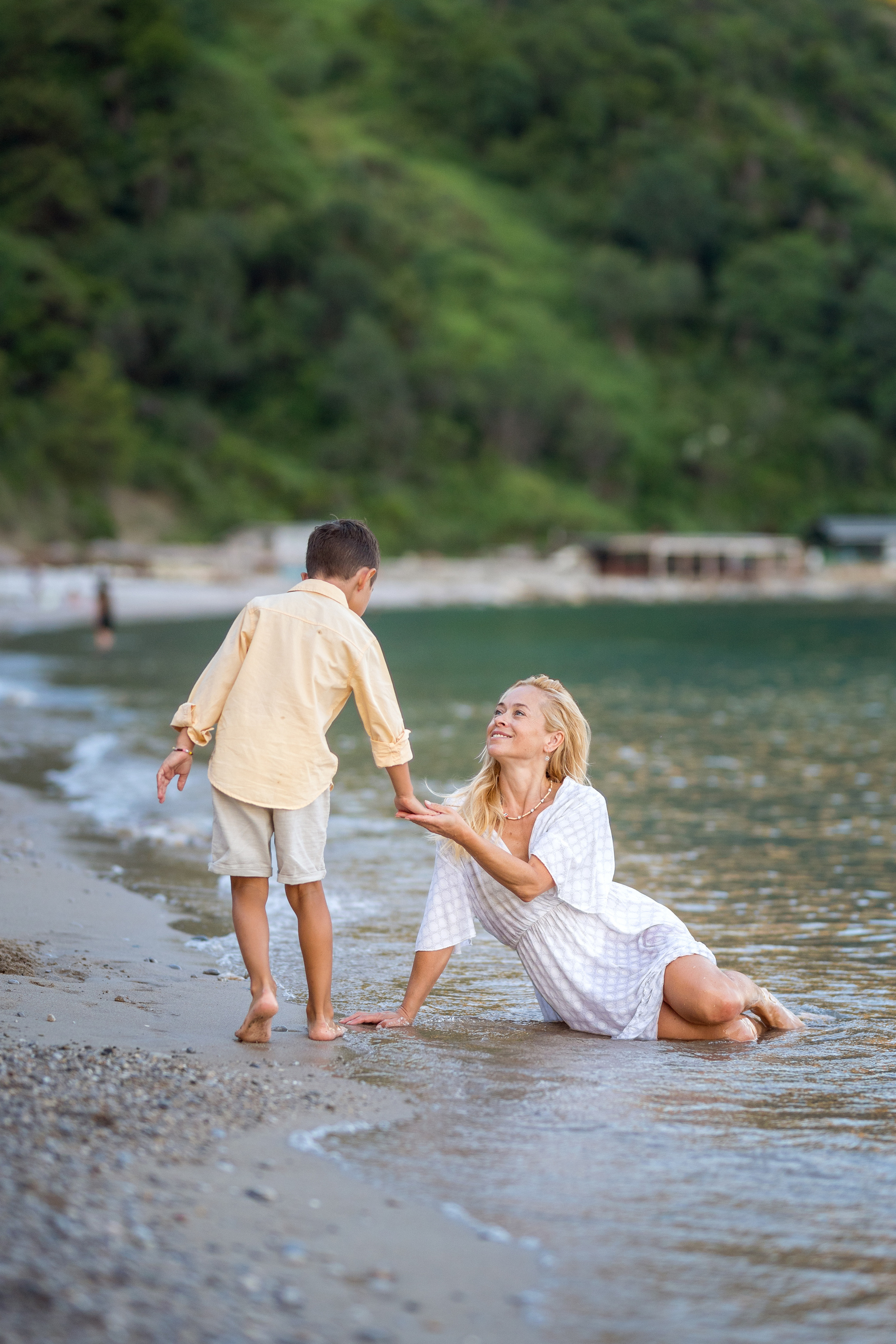 Photo session of a mother and son on the beach in Budva, Montenegro. Kate Khaldeeva photographer in Saratov