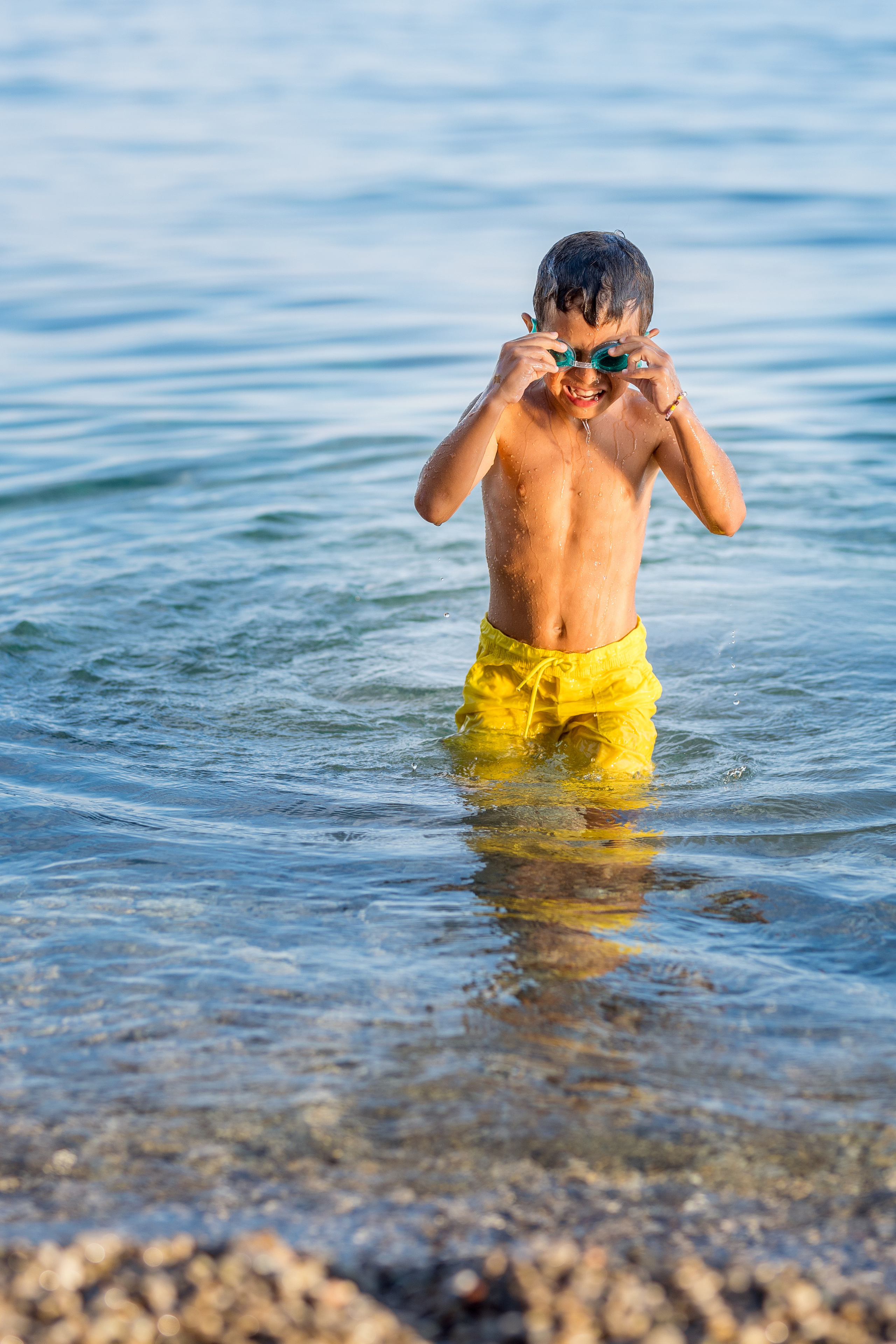 Photo session of a mother and son on the beach in Budva, Montenegro. Kate Khaldeeva photographer in Saratov