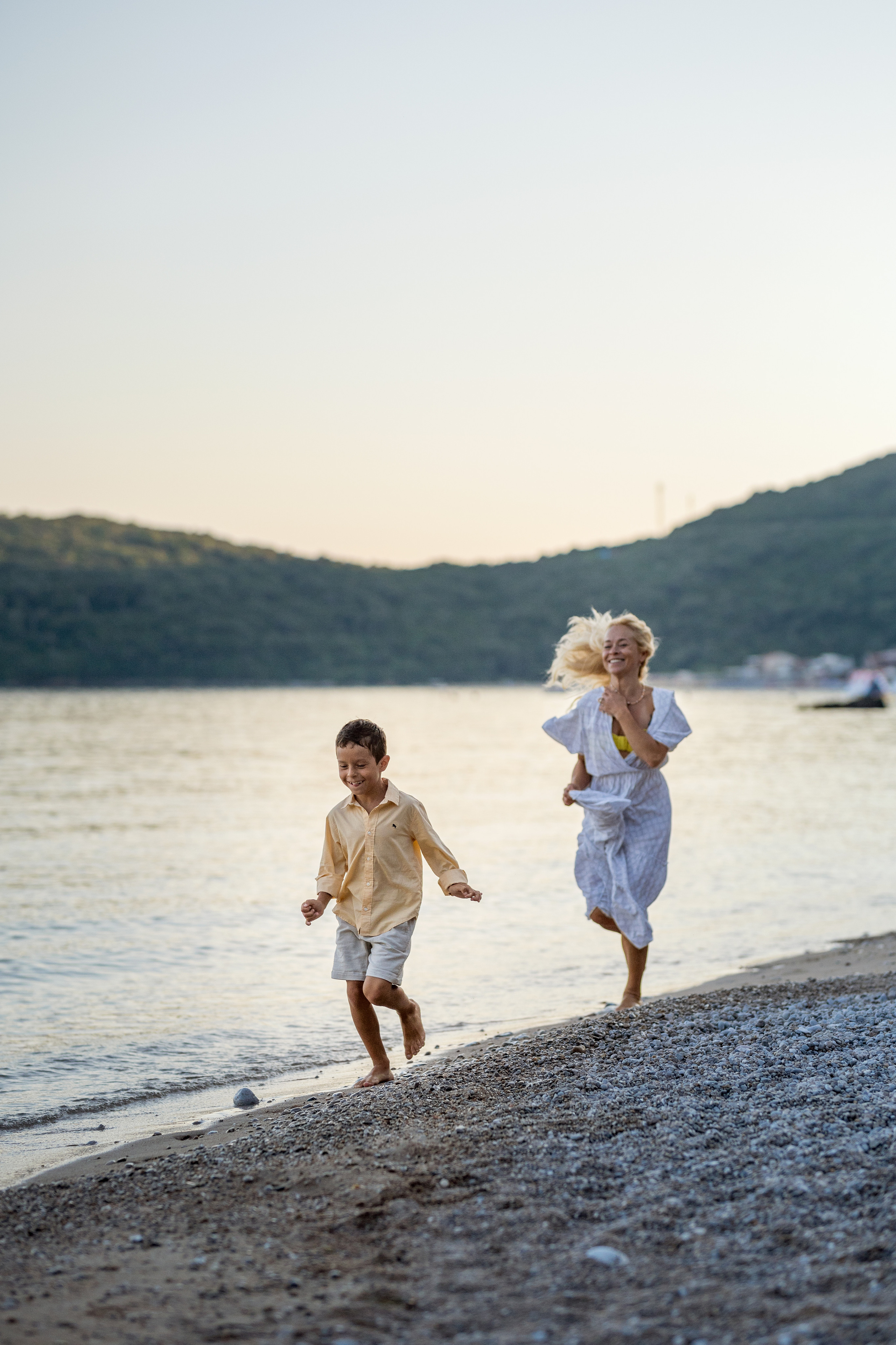 Photo session of a mother and son on the beach in Budva, Montenegro. Kate Khaldeeva photographer in Saratov